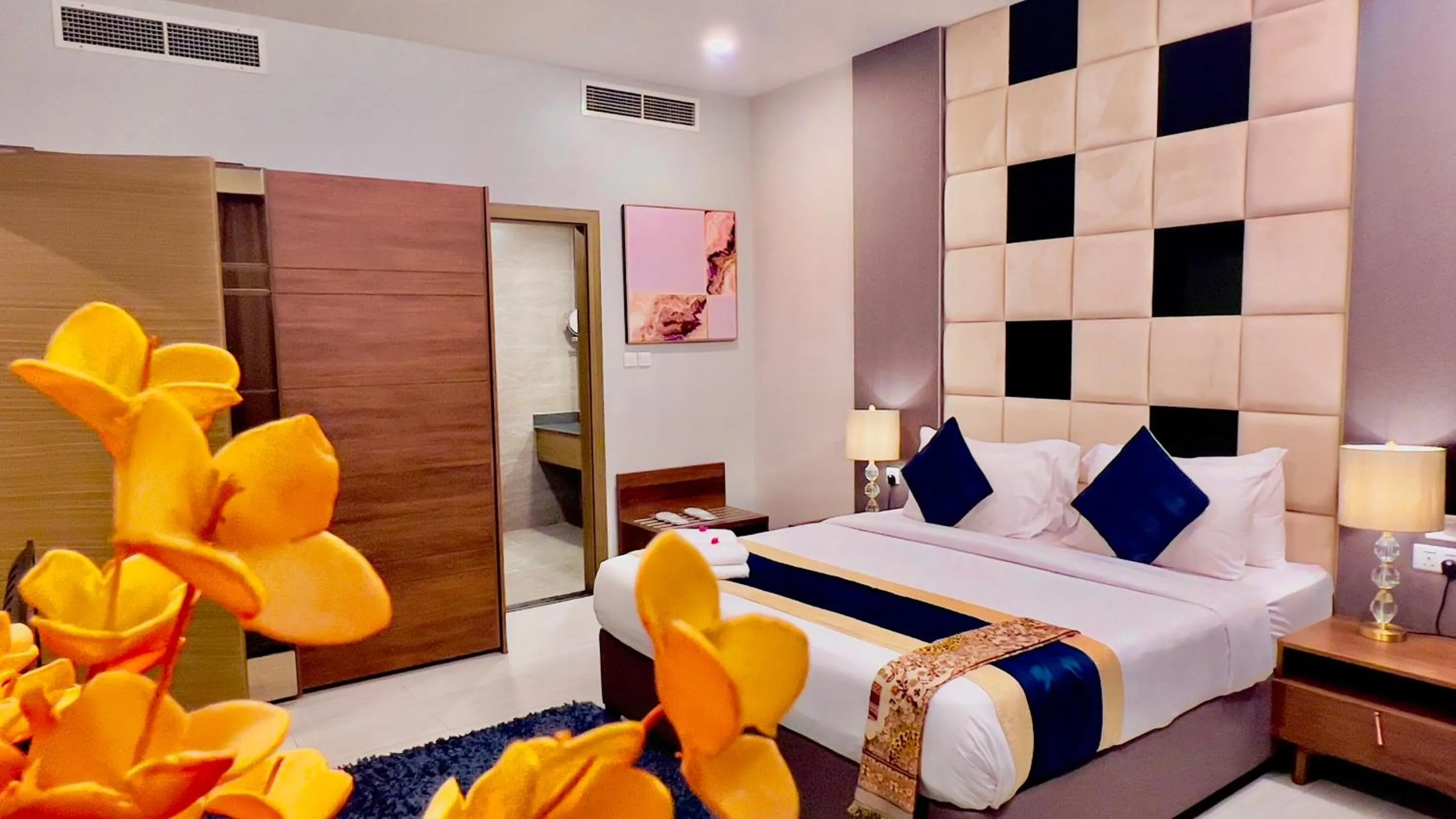 Bed in BW Suites & Spa