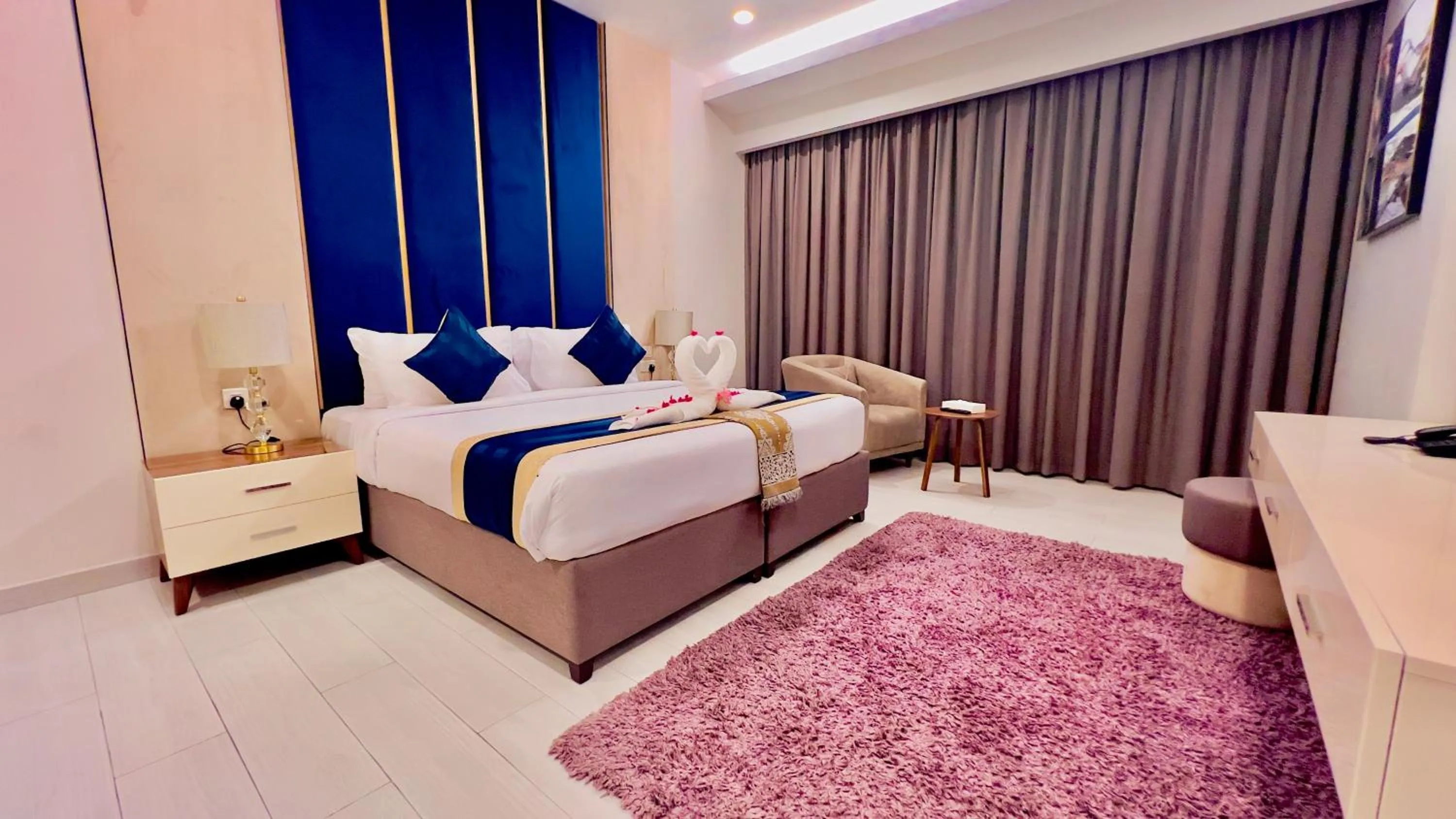 Bed in BW Suites & Spa