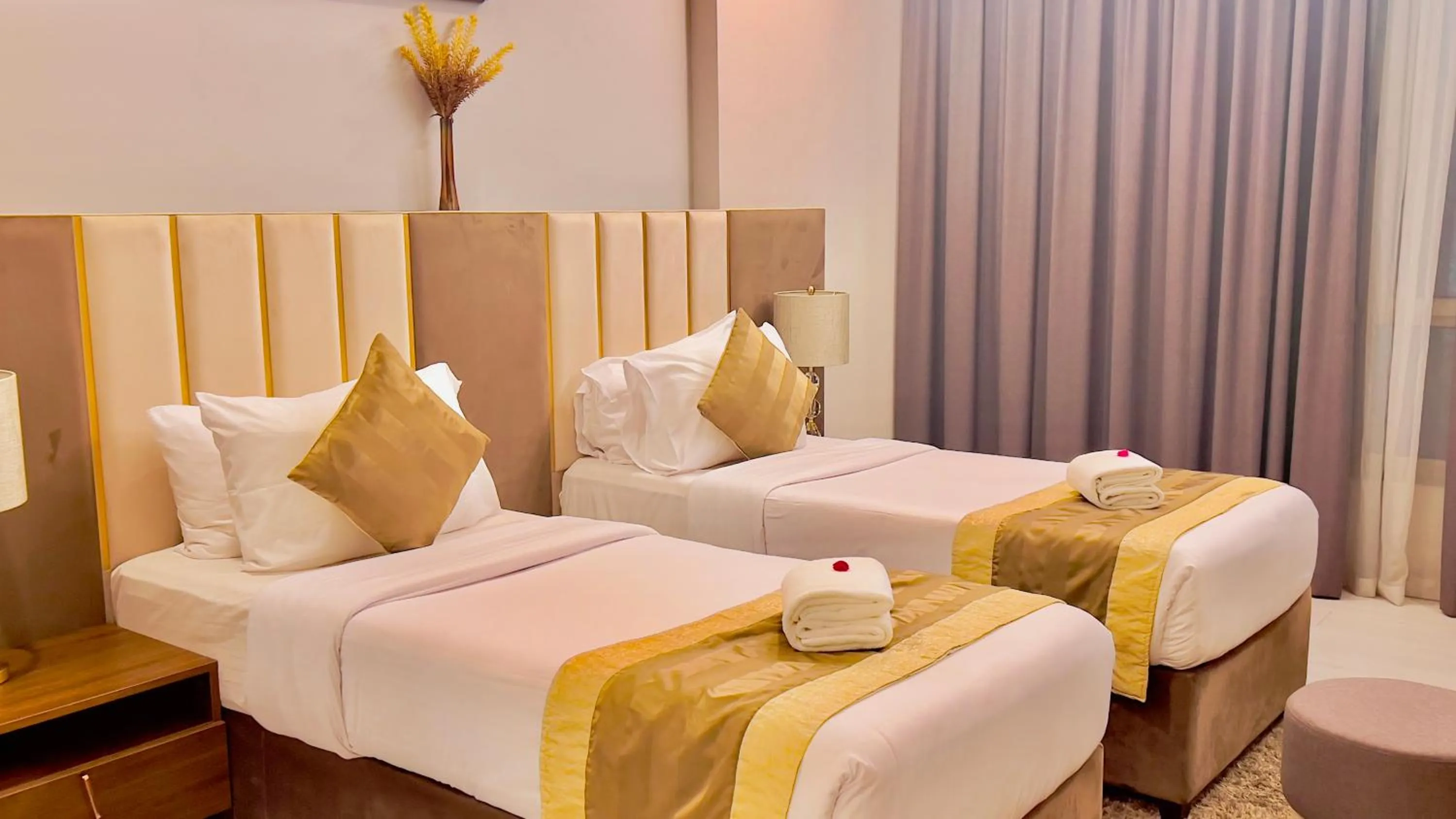 Bed in BW Suites & Spa