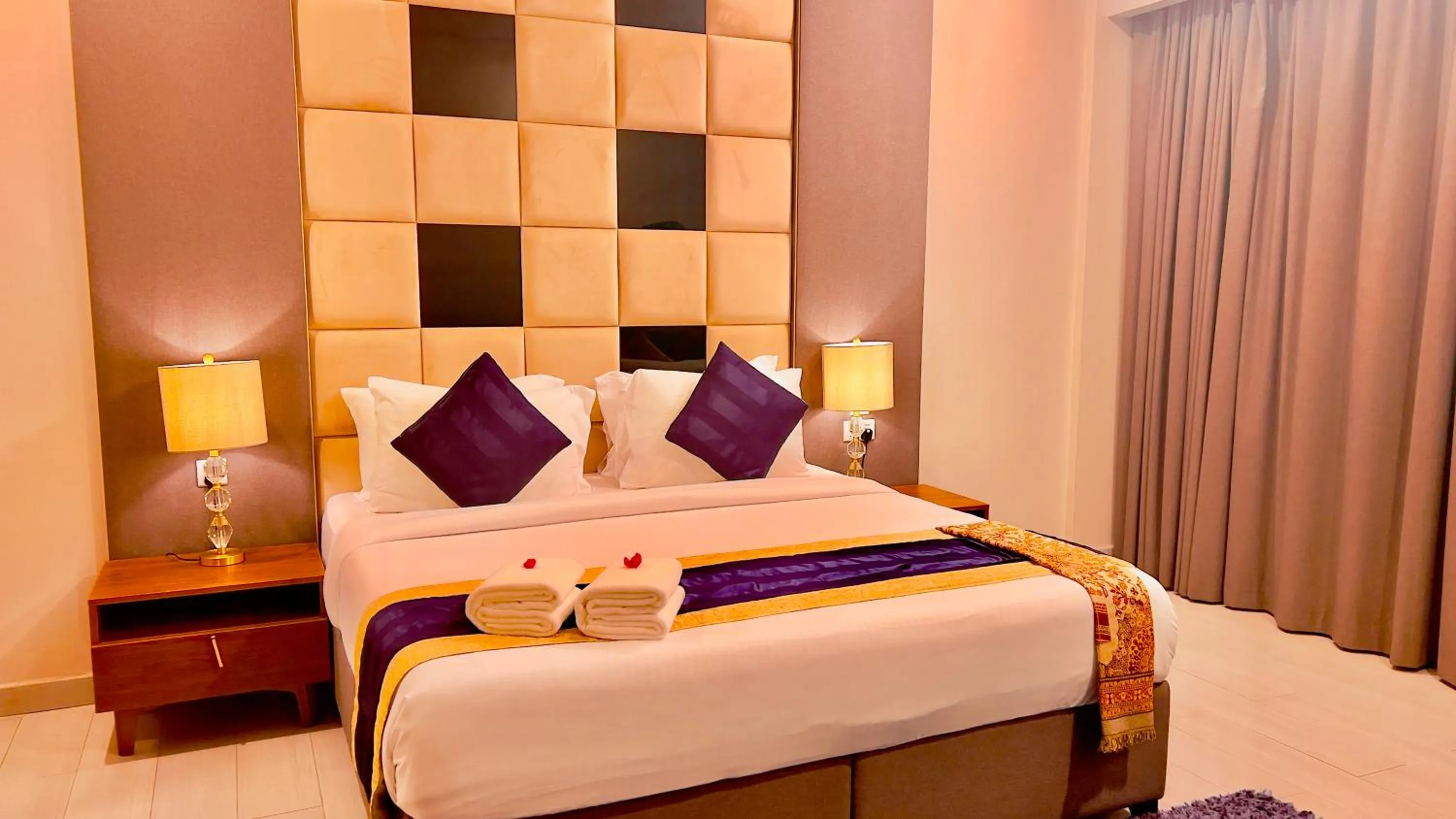 Bed in BW Suites & Spa