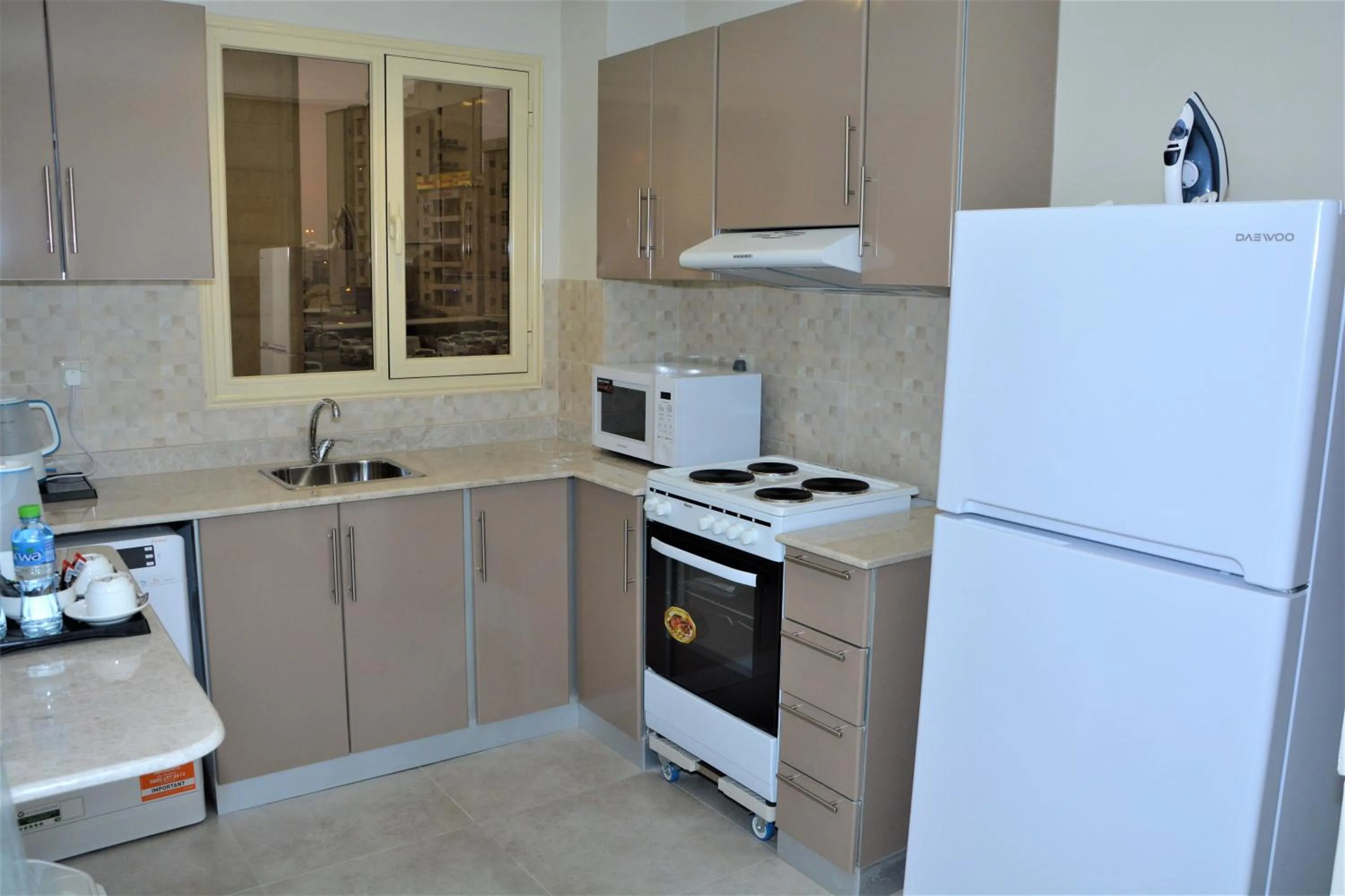Kitchen or kitchenette in The Lofts Kuwait Fintas