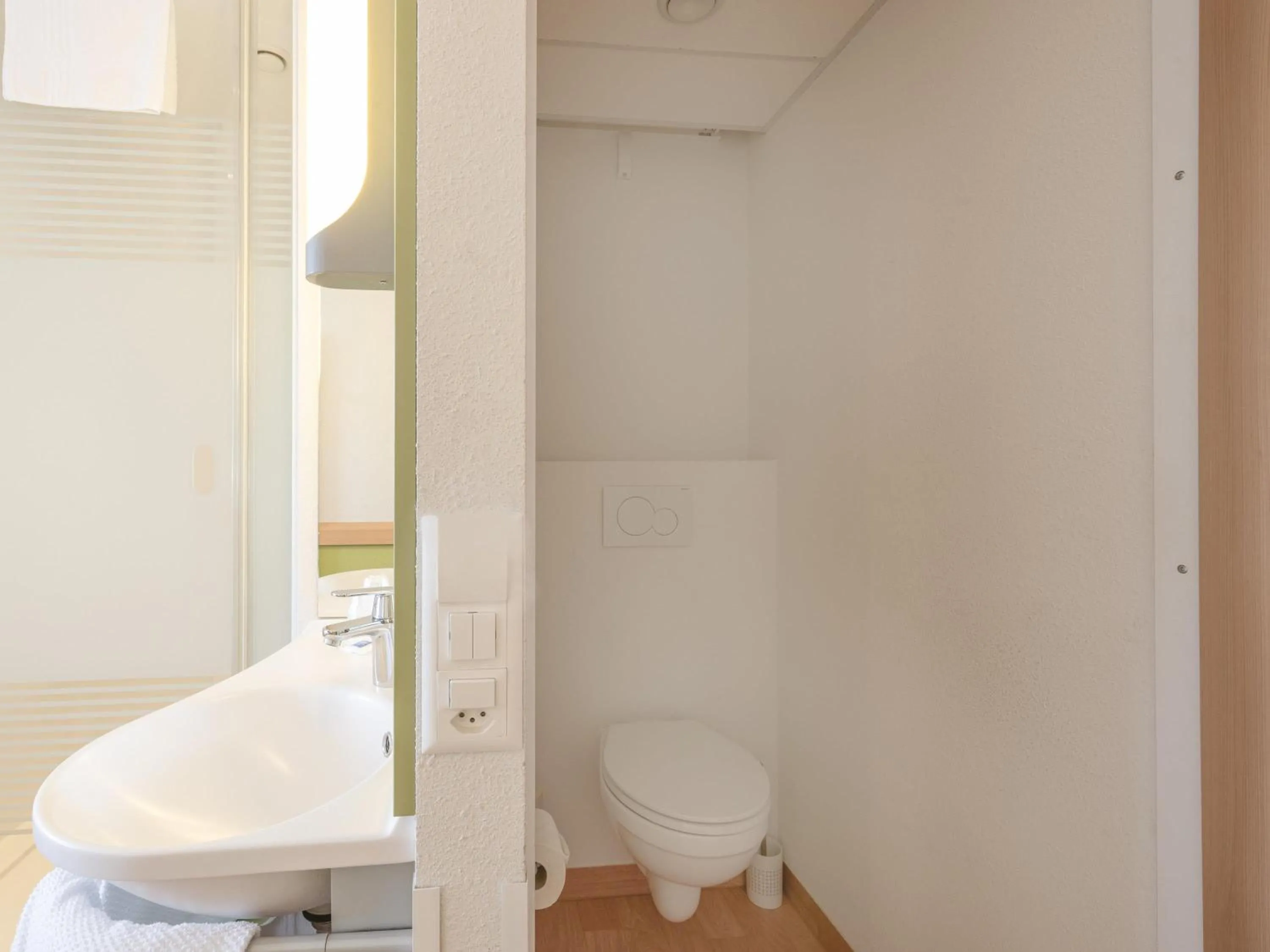 Bedroom in ibis budget Bern Expo