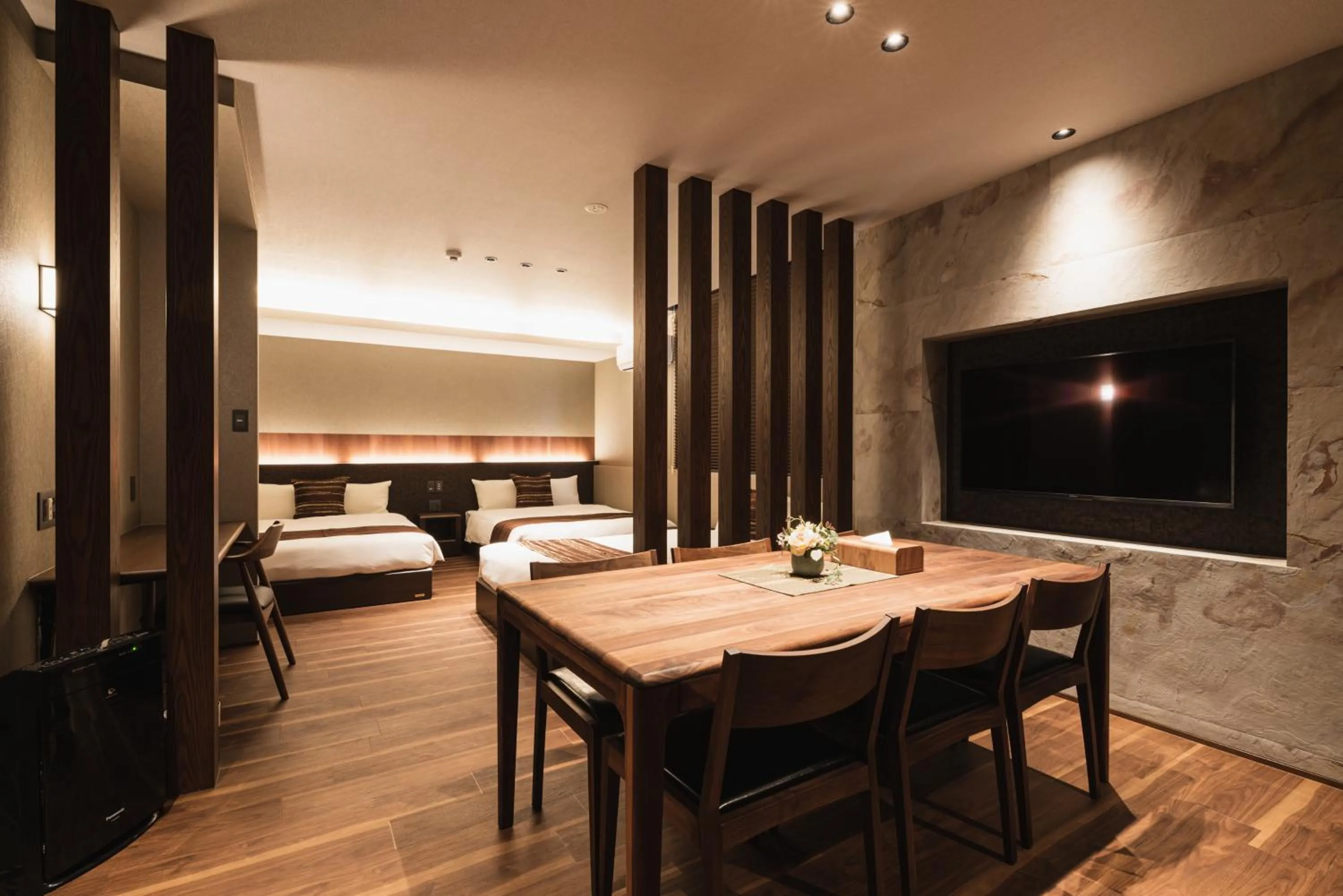 Photo of the whole room, Bed in GRAND BASE Beppu Ekihigashi