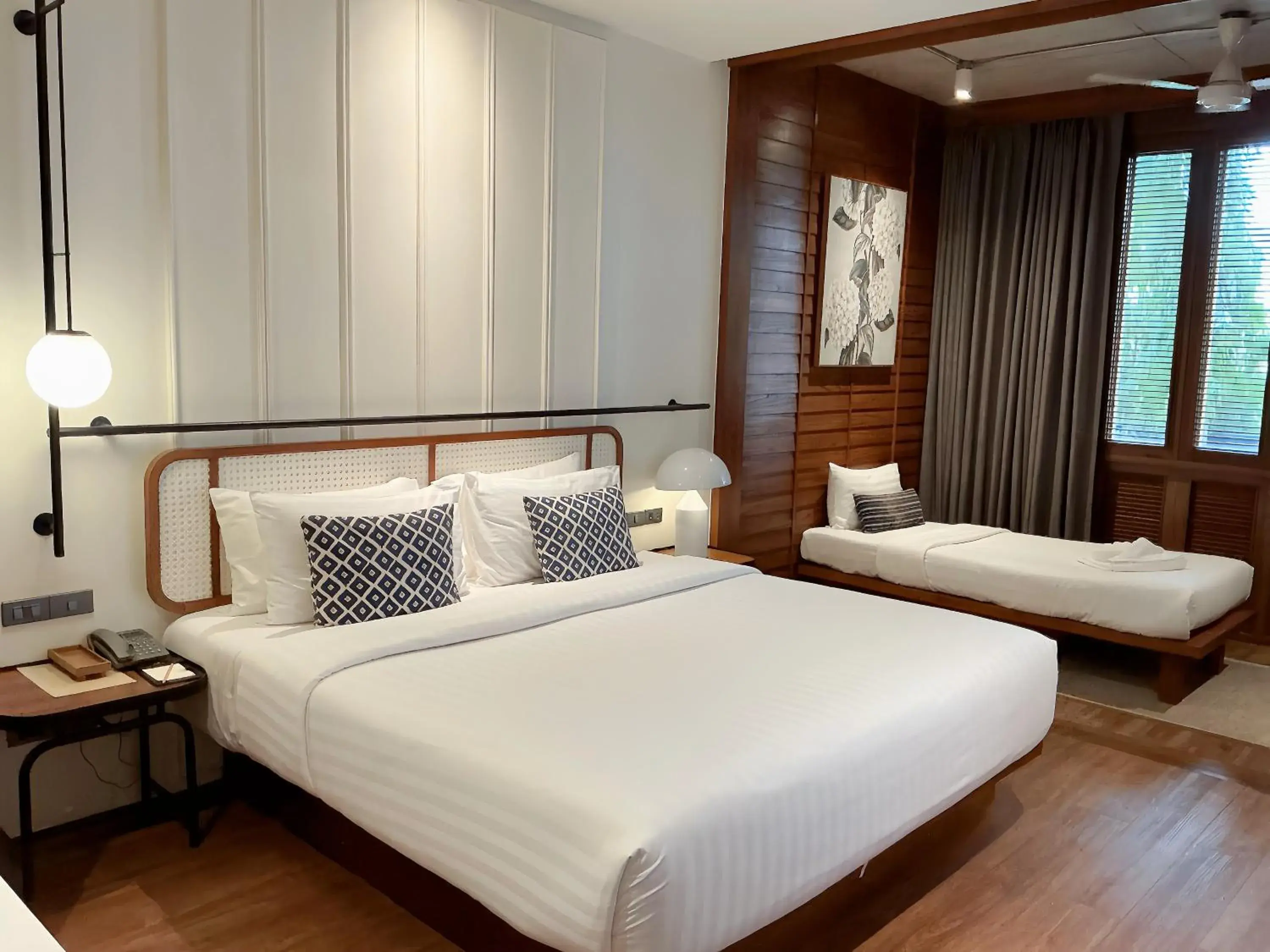 Deluxe Triple Room in Hotel Loy Chiang Mai Deluxe Triple Room in Hotel Loy Chiang Mai