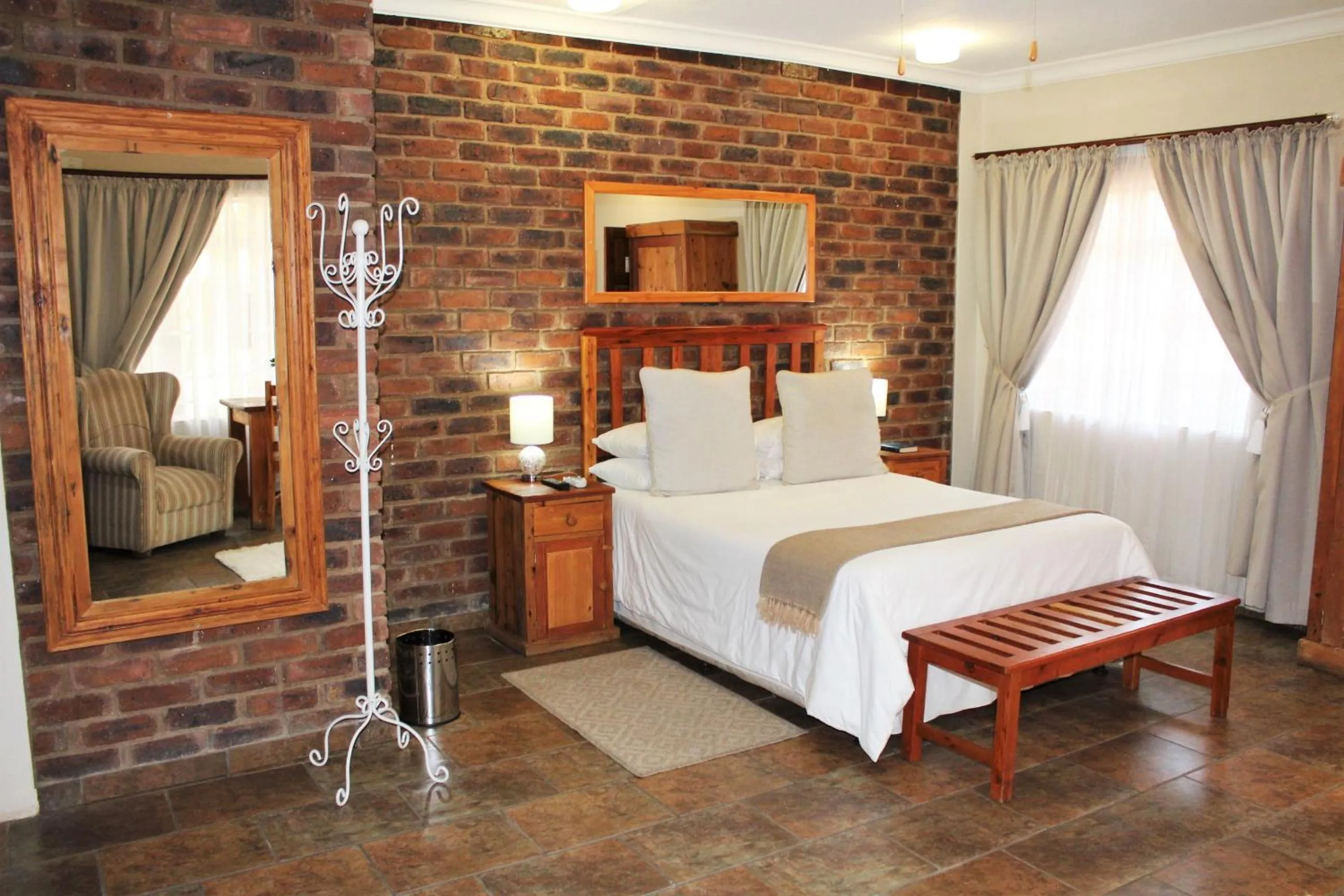 Bed in Ngwenya Boutique Hotel