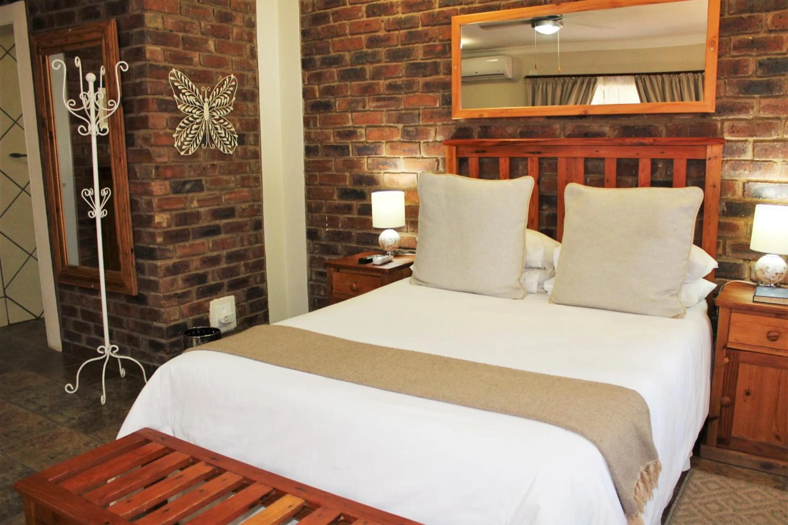 Bed in Ngwenya Boutique Hotel