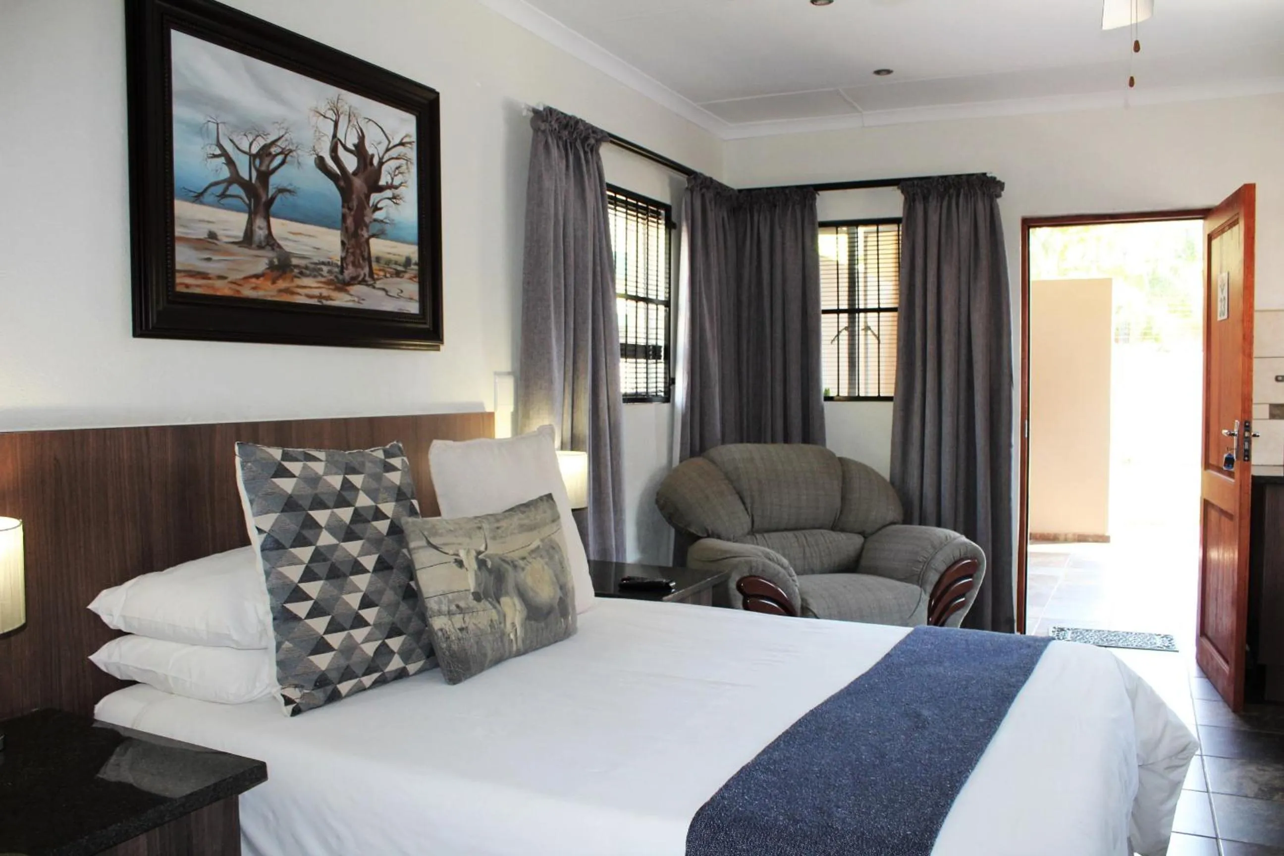 Bed in Ngwenya Boutique Hotel