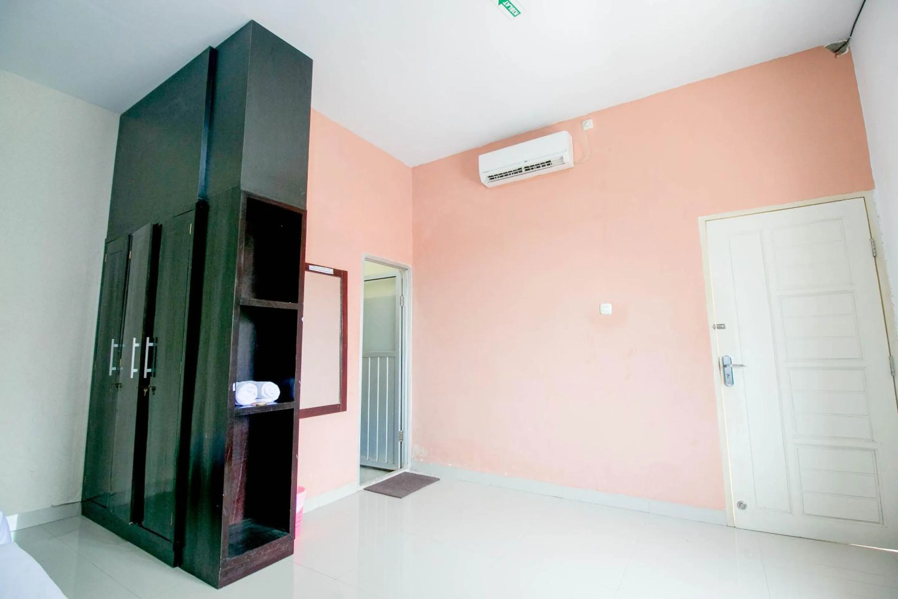 Bedroom in Grand Azizah Makassar RedPartner