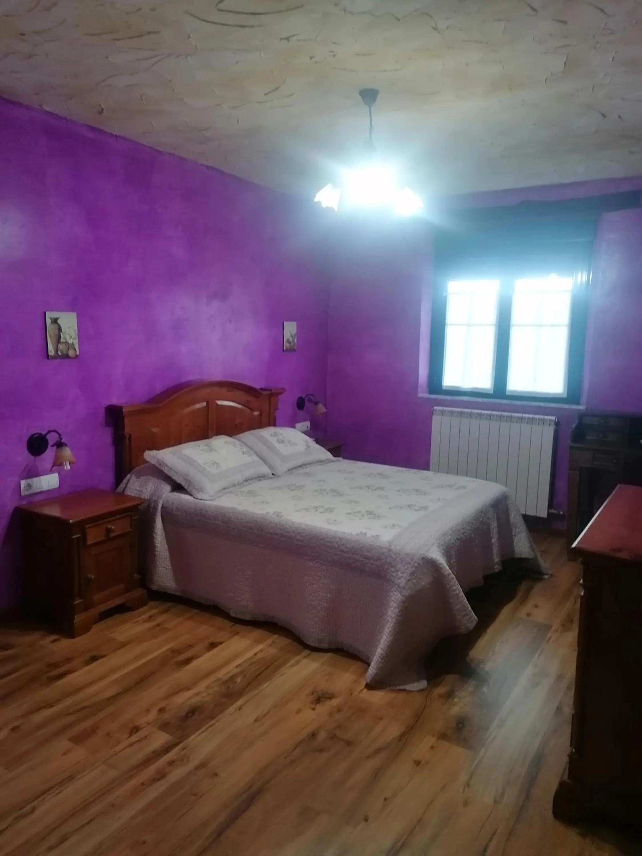 Bed in Hostería Casa Flor