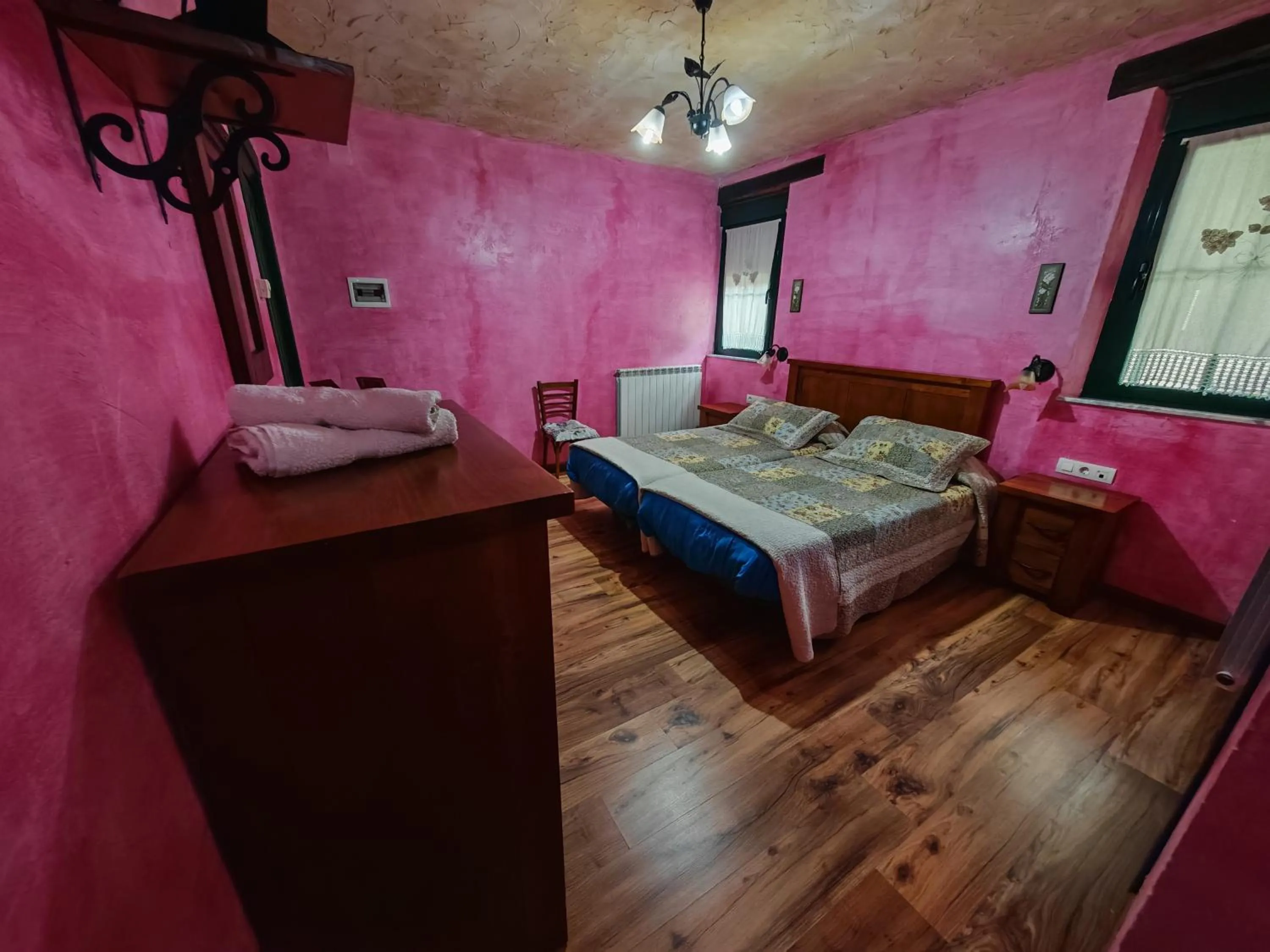 Bed in Hostería Casa Flor