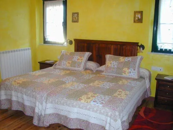 Bed in Hostería Casa Flor