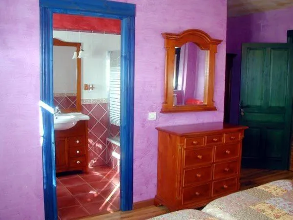 Bed in Hostería Casa Flor