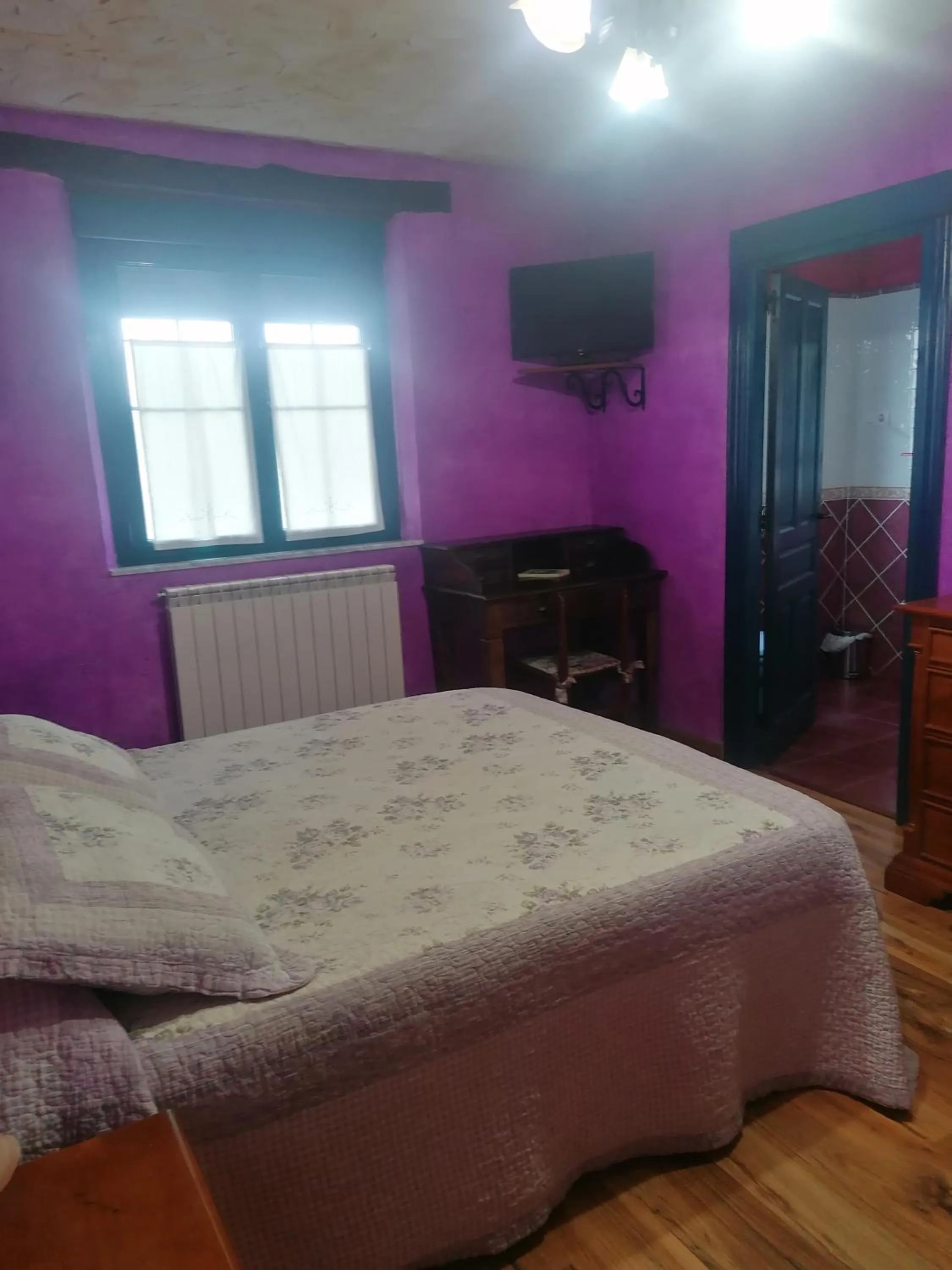 Bed in Hostería Casa Flor