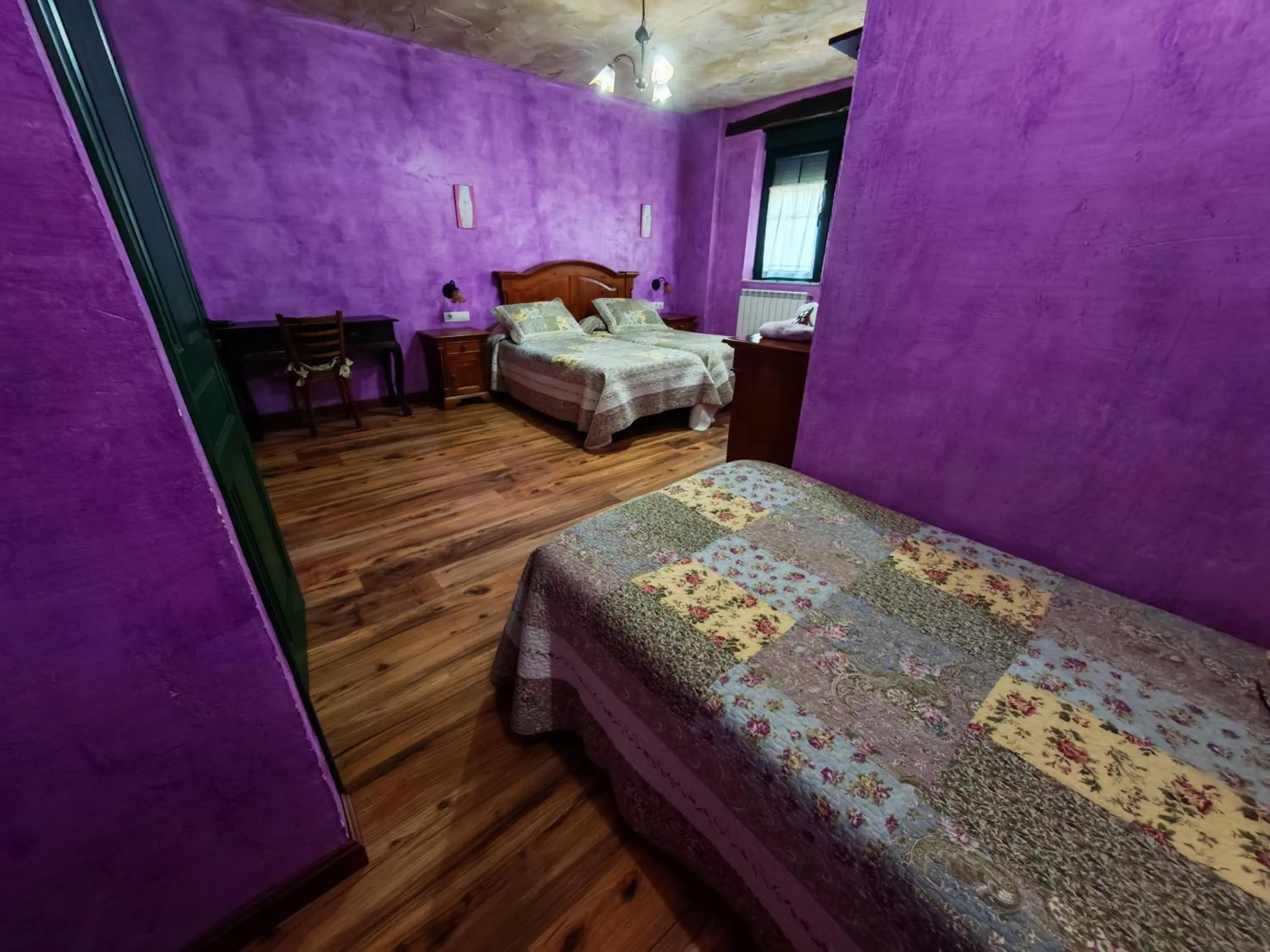 Bed in Hostería Casa Flor