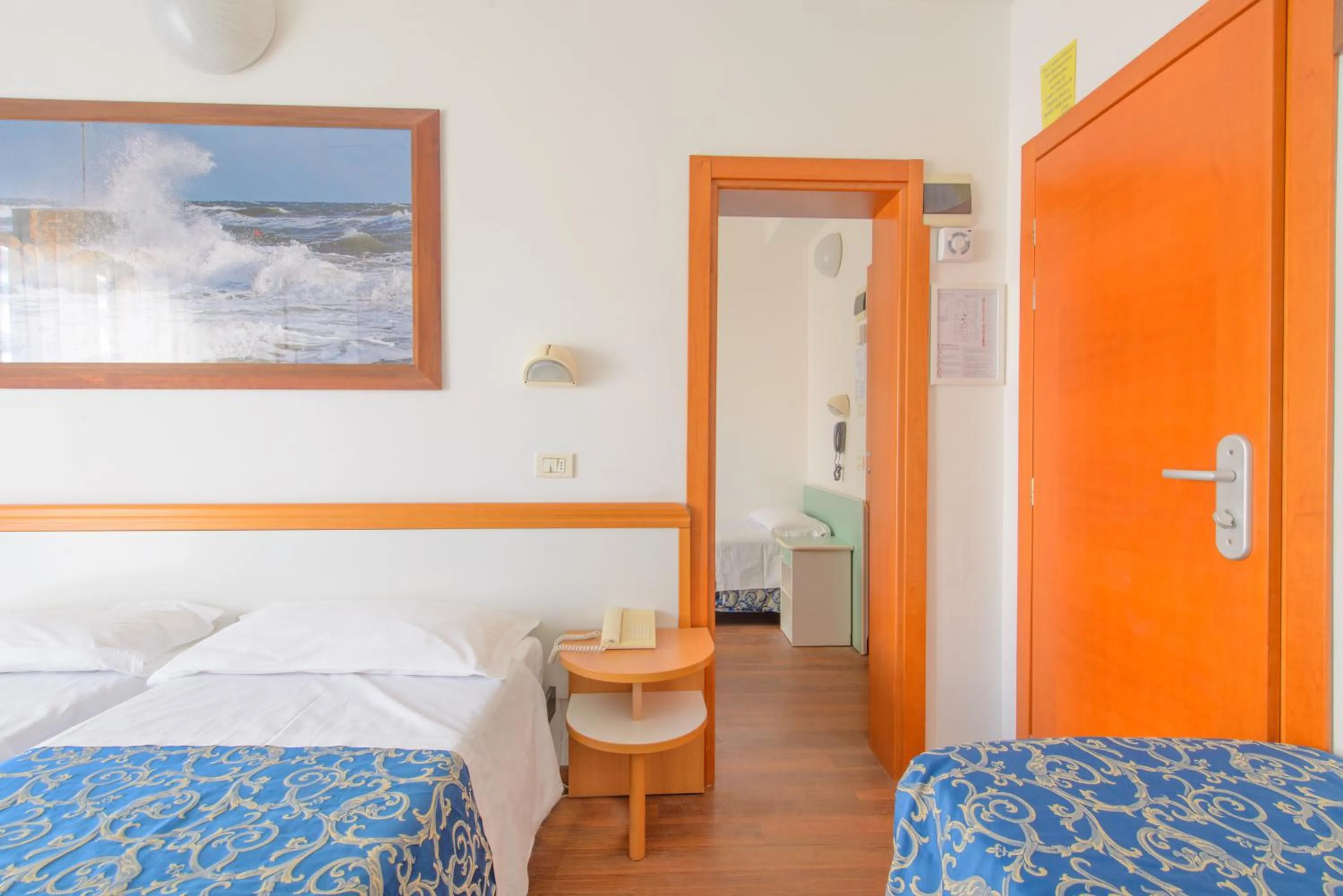 Bed in Hotel San Marino