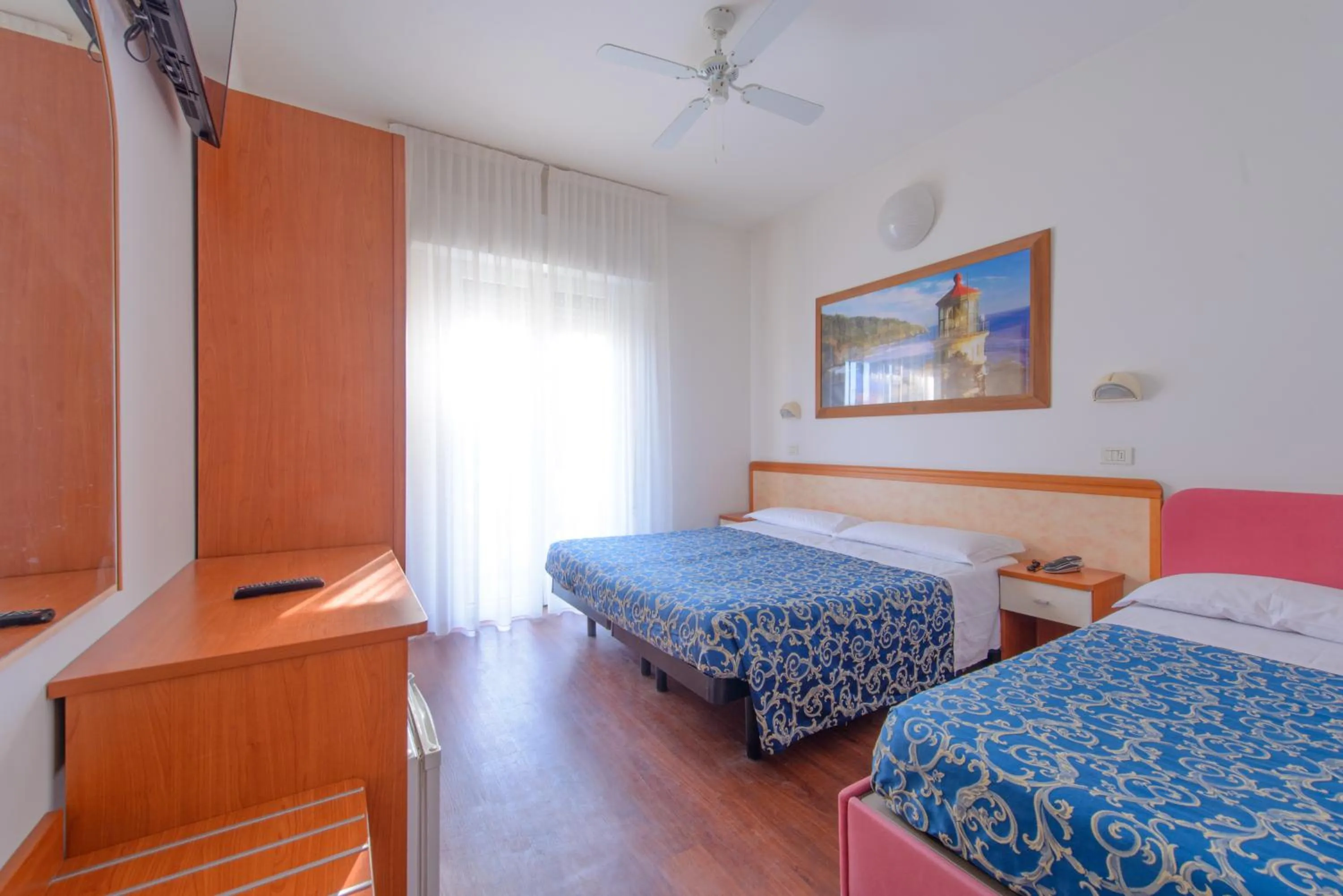 Bed in Hotel San Marino