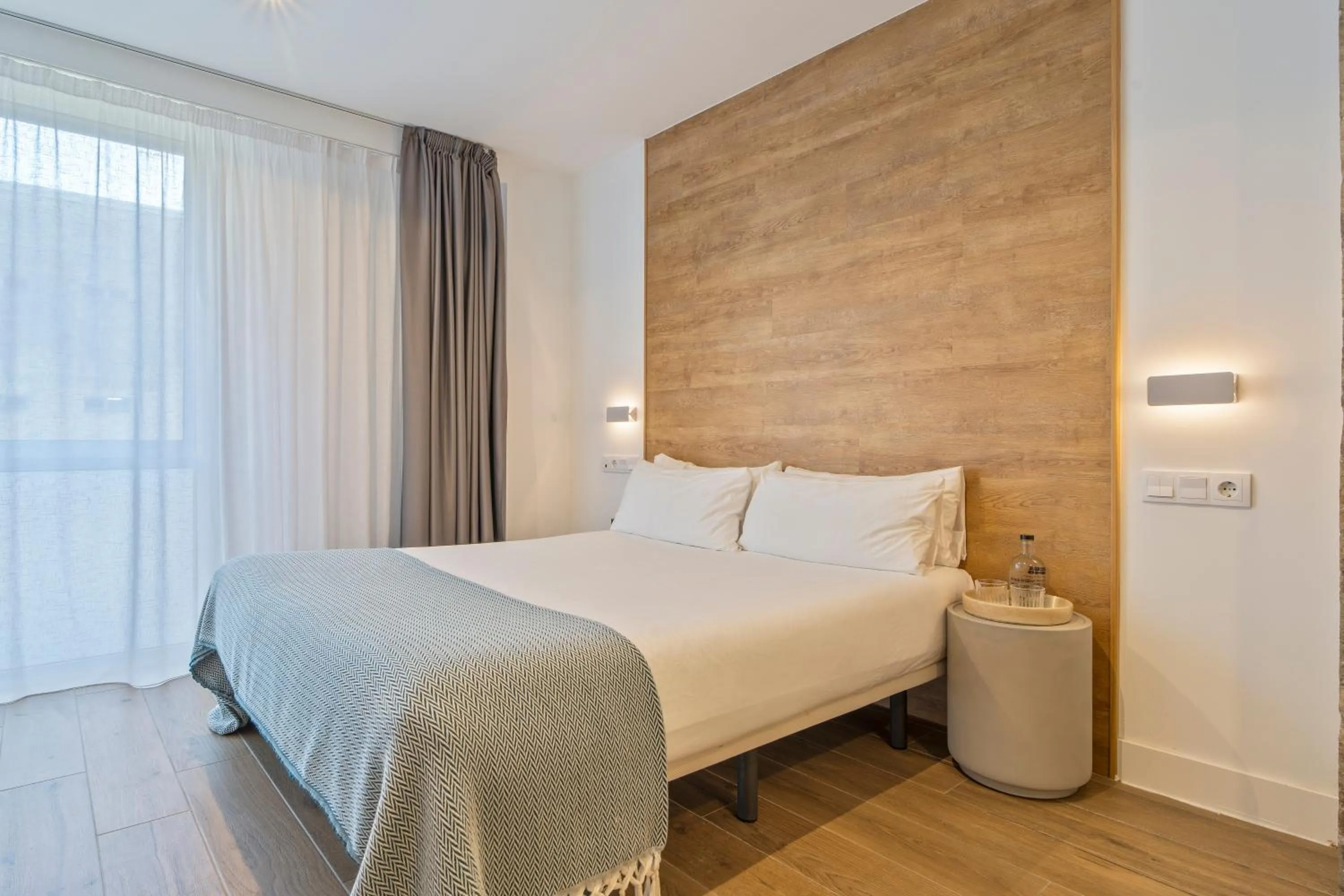 Bed in Uma Suites Ondarreta