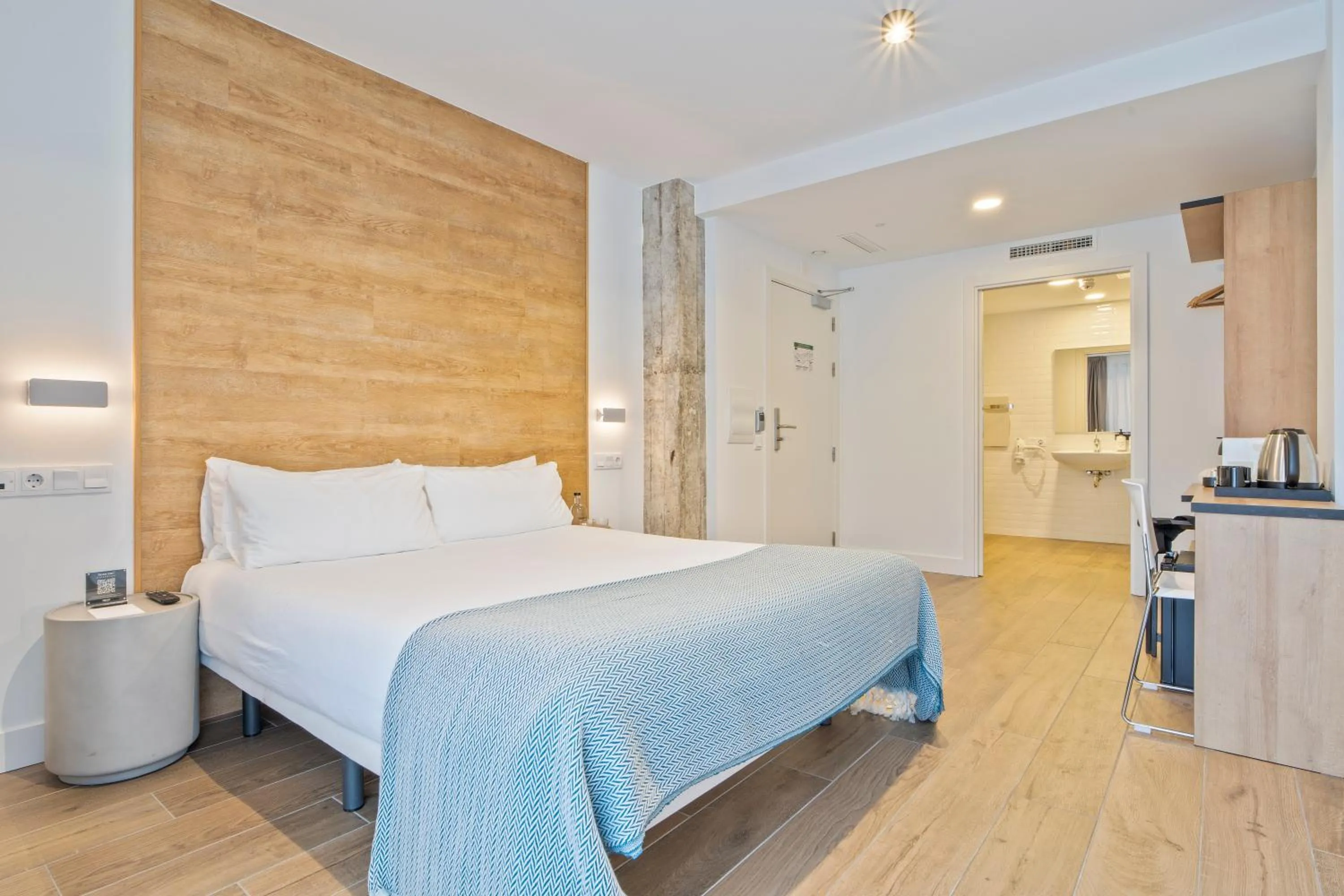 Bed in Uma Suites Ondarreta