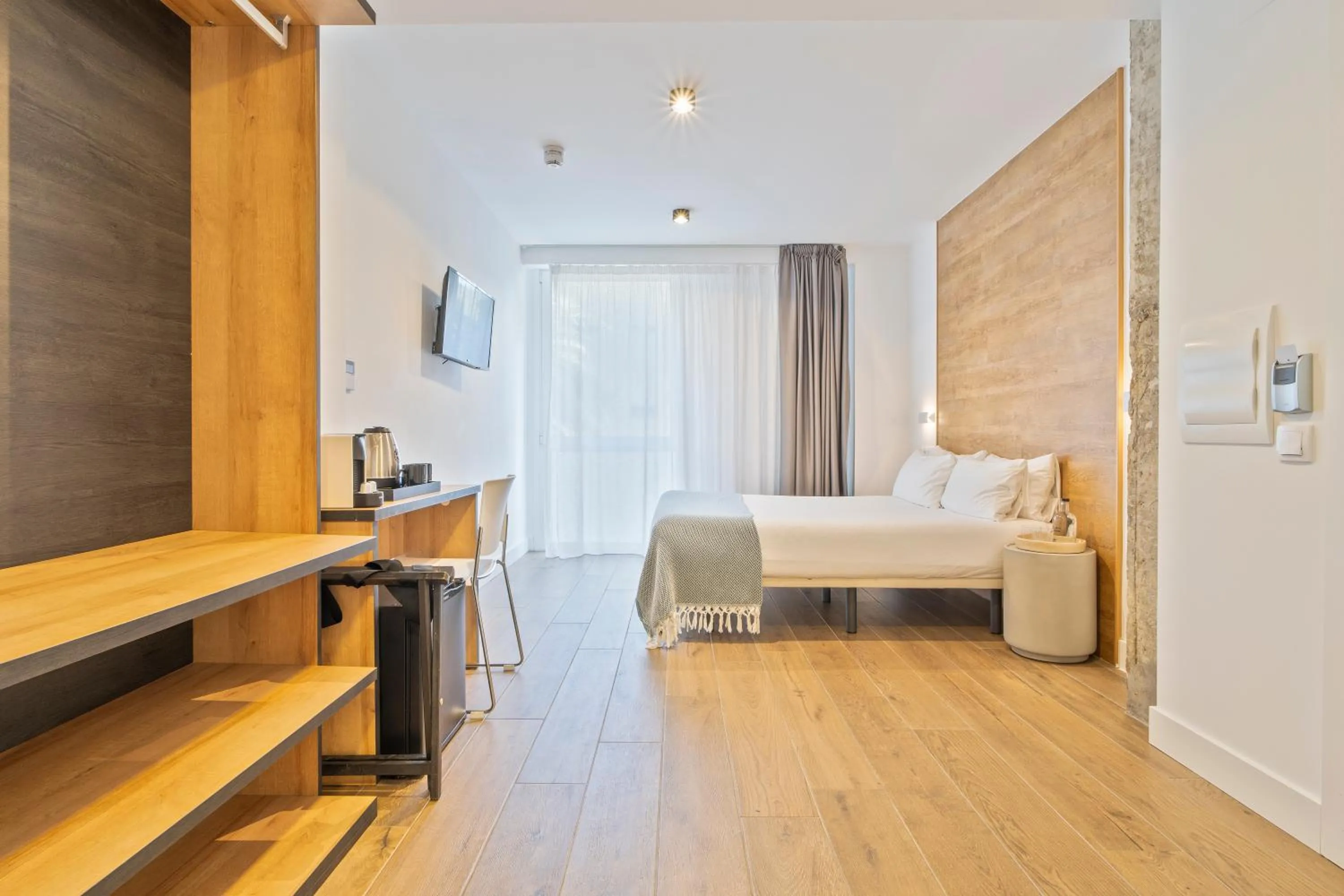 Bed in Uma Suites Ondarreta