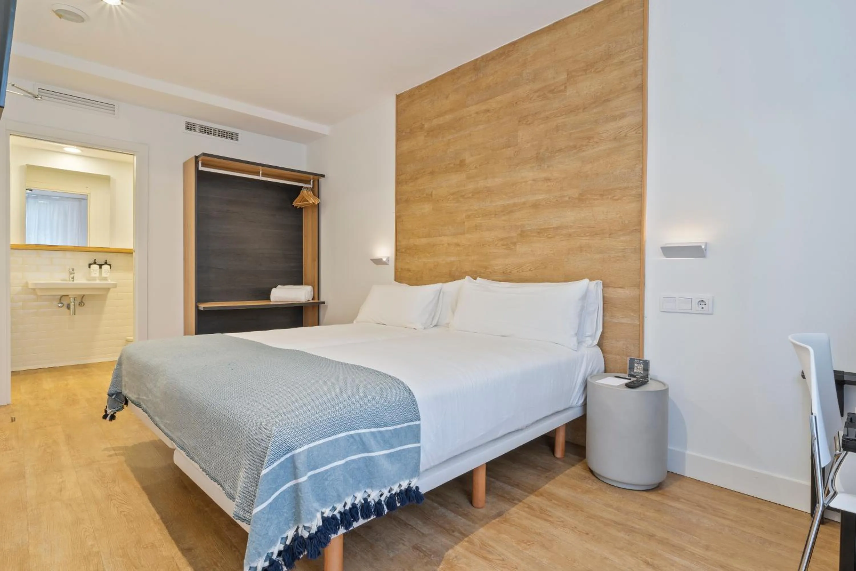 Bed in Uma Suites Ondarreta
