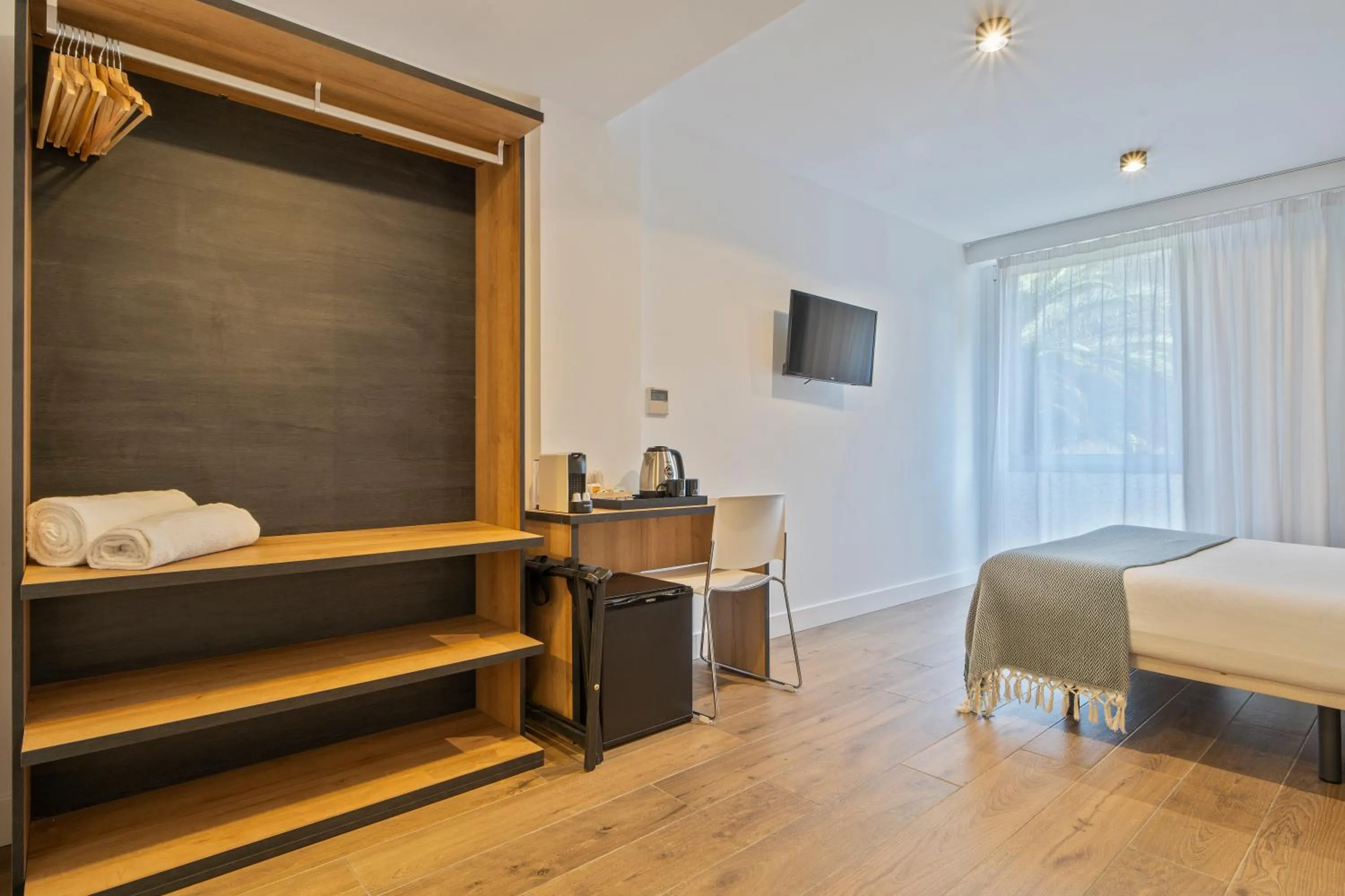 Bed in Uma Suites Ondarreta