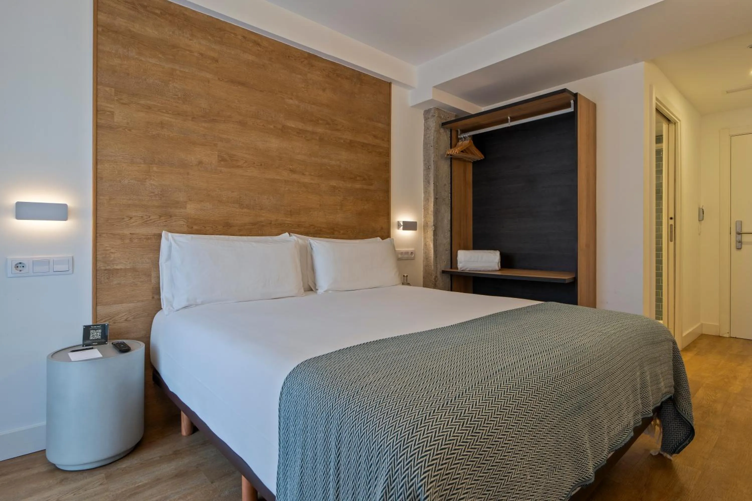 Bed in Uma Suites Ondarreta