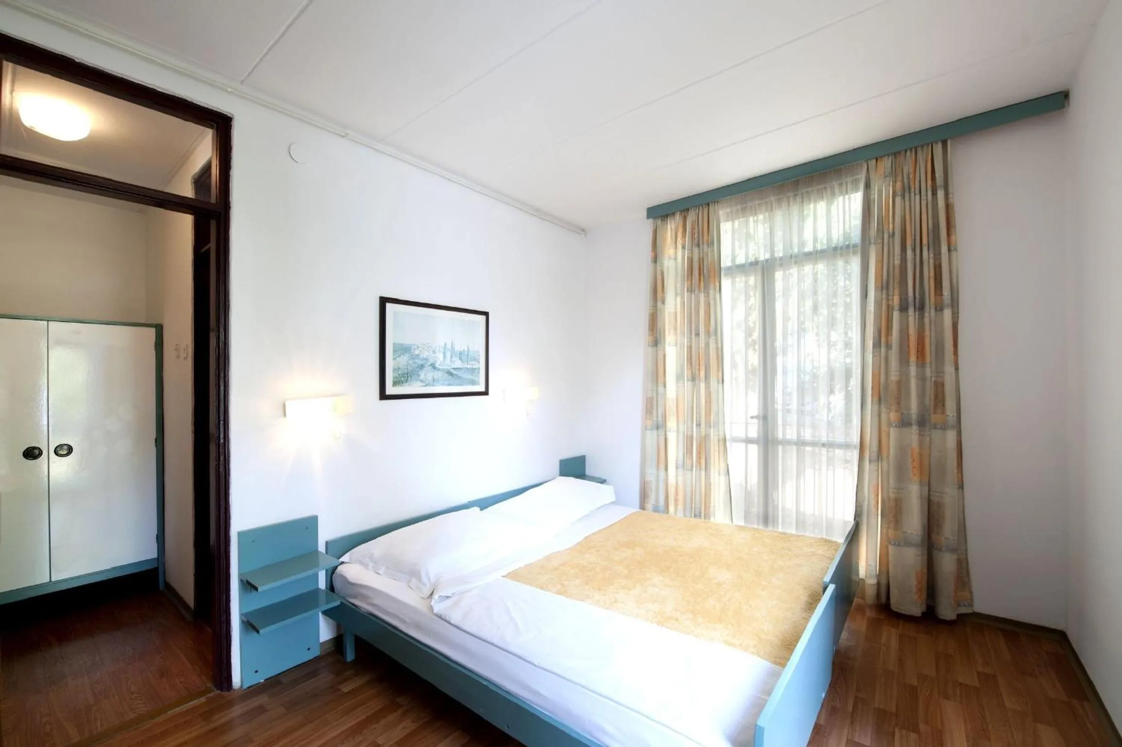 Bed in Apartments Astra