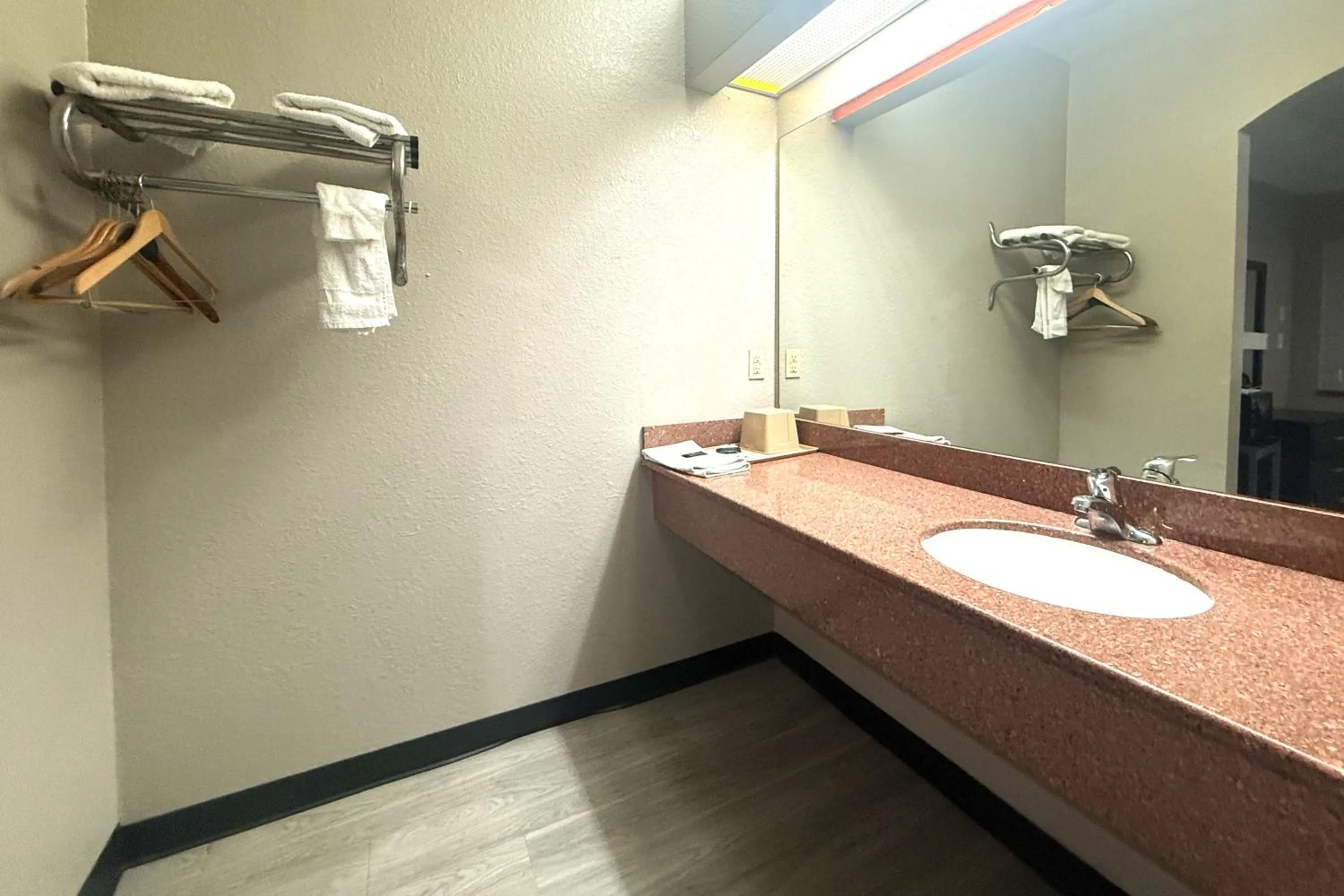 Bathroom in Hotel O Regency Suites Houston - IAH Beltway 8