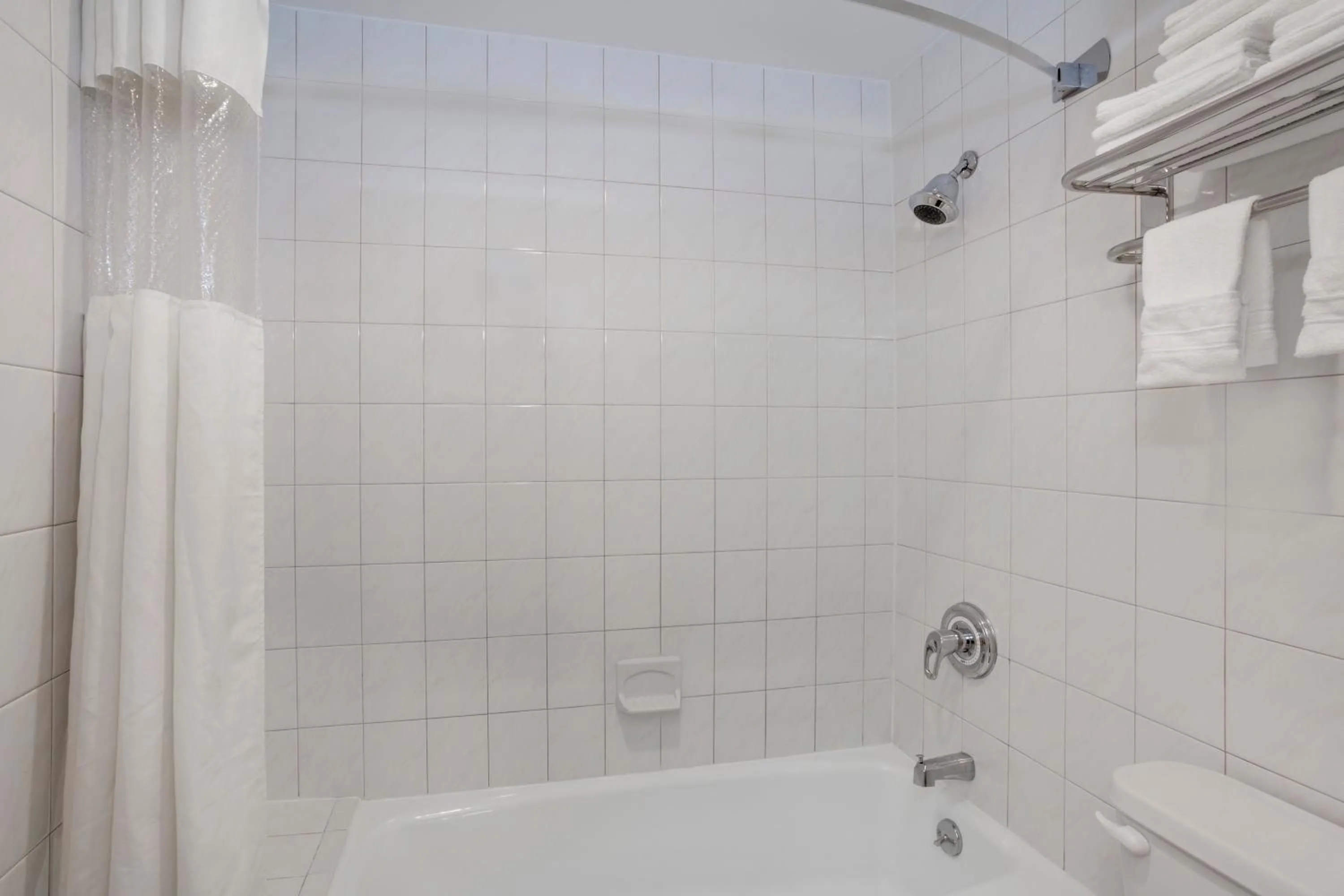 Bathroom in Days Inn by Wyndham Woodbury Long Island