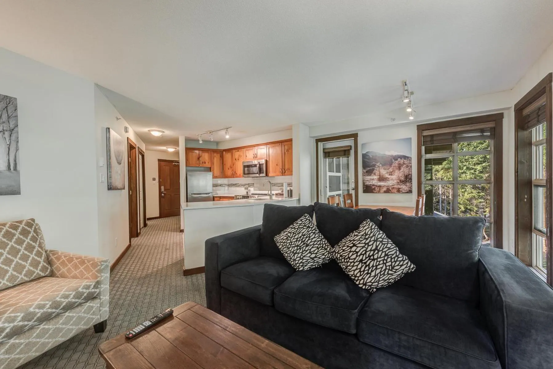 Kitchen or kitchenette in Blackcomb Springs Suites by CLIQUE