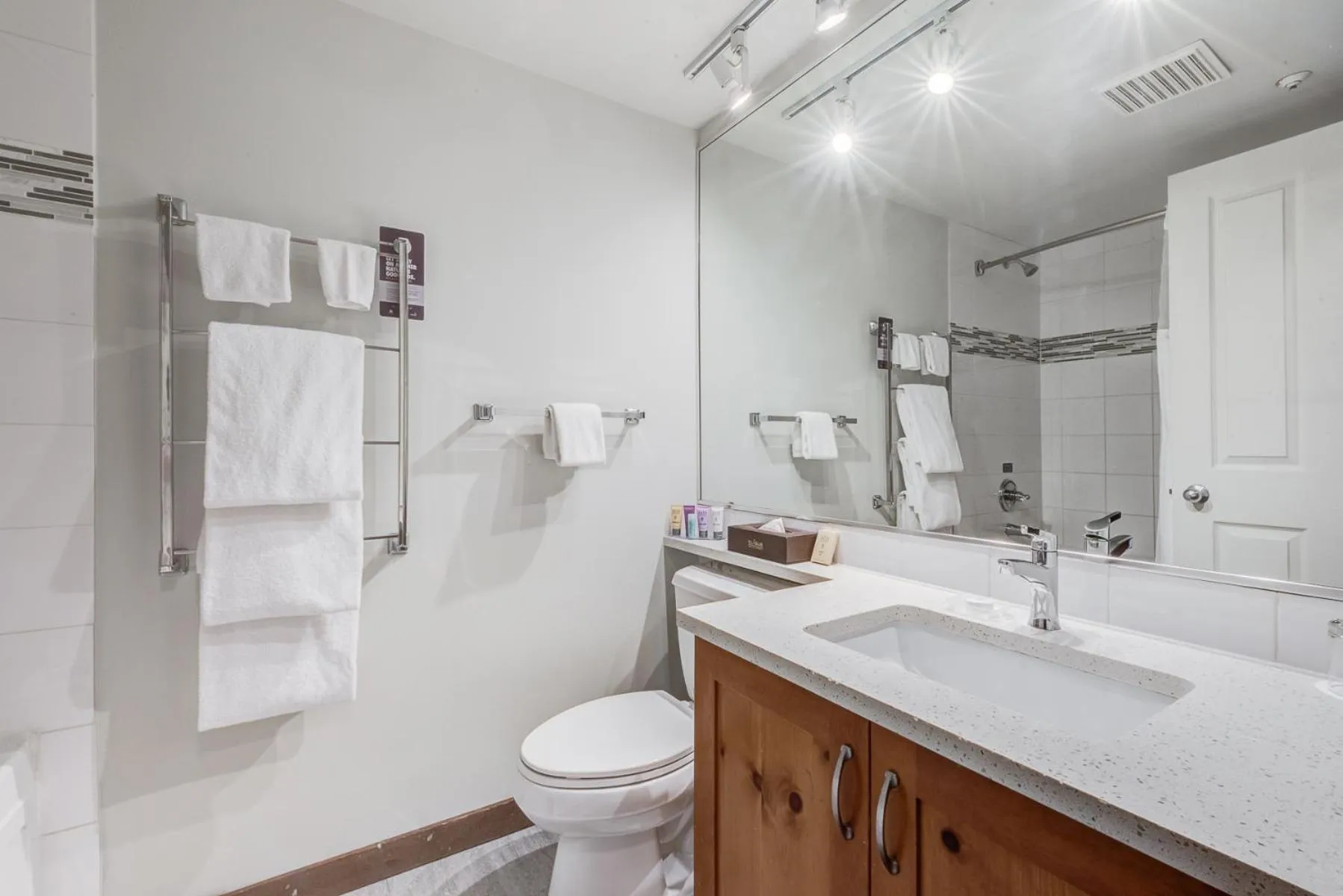 Shower in Blackcomb Springs Suites by CLIQUE