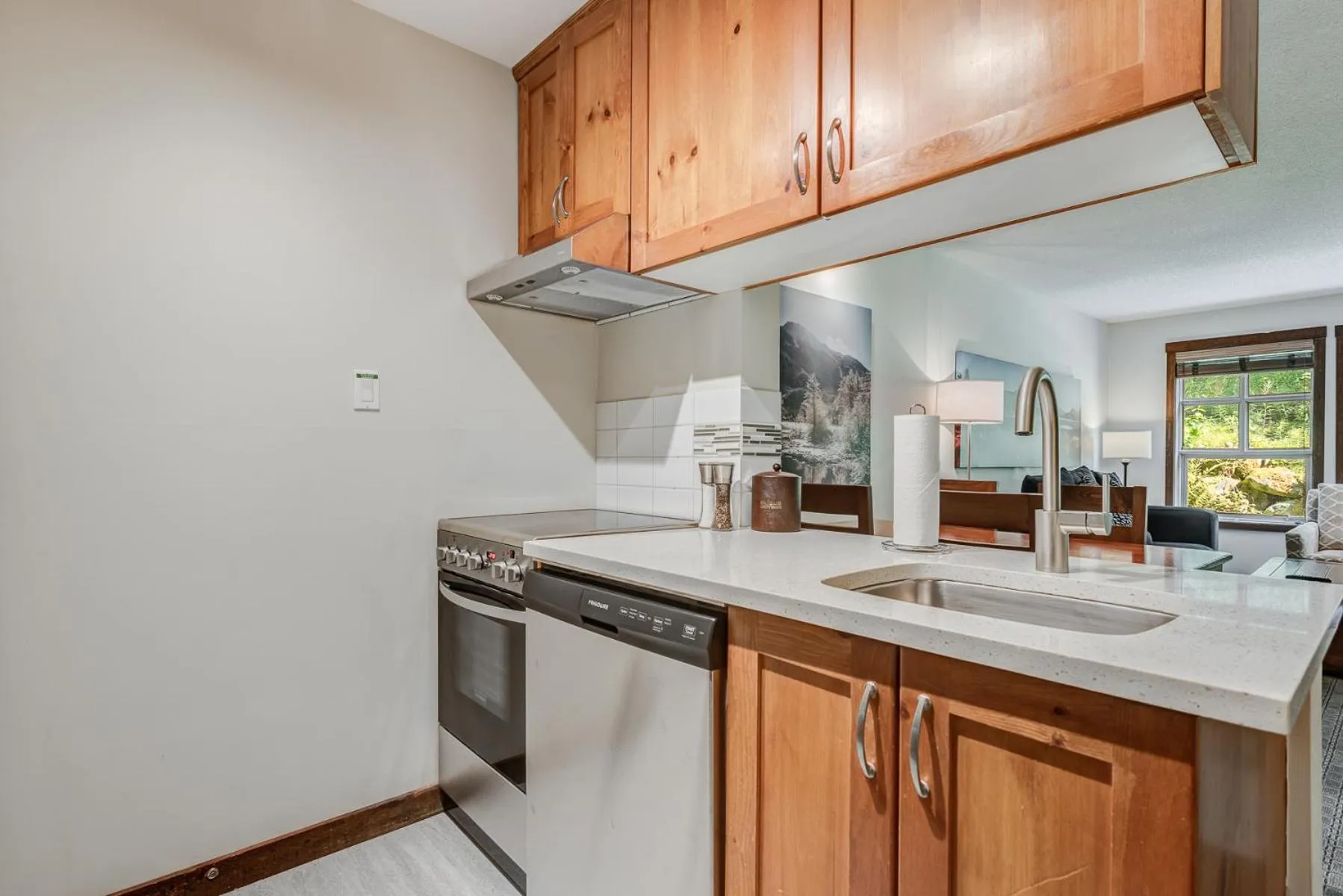 Kitchen or kitchenette in Blackcomb Springs Suites by CLIQUE