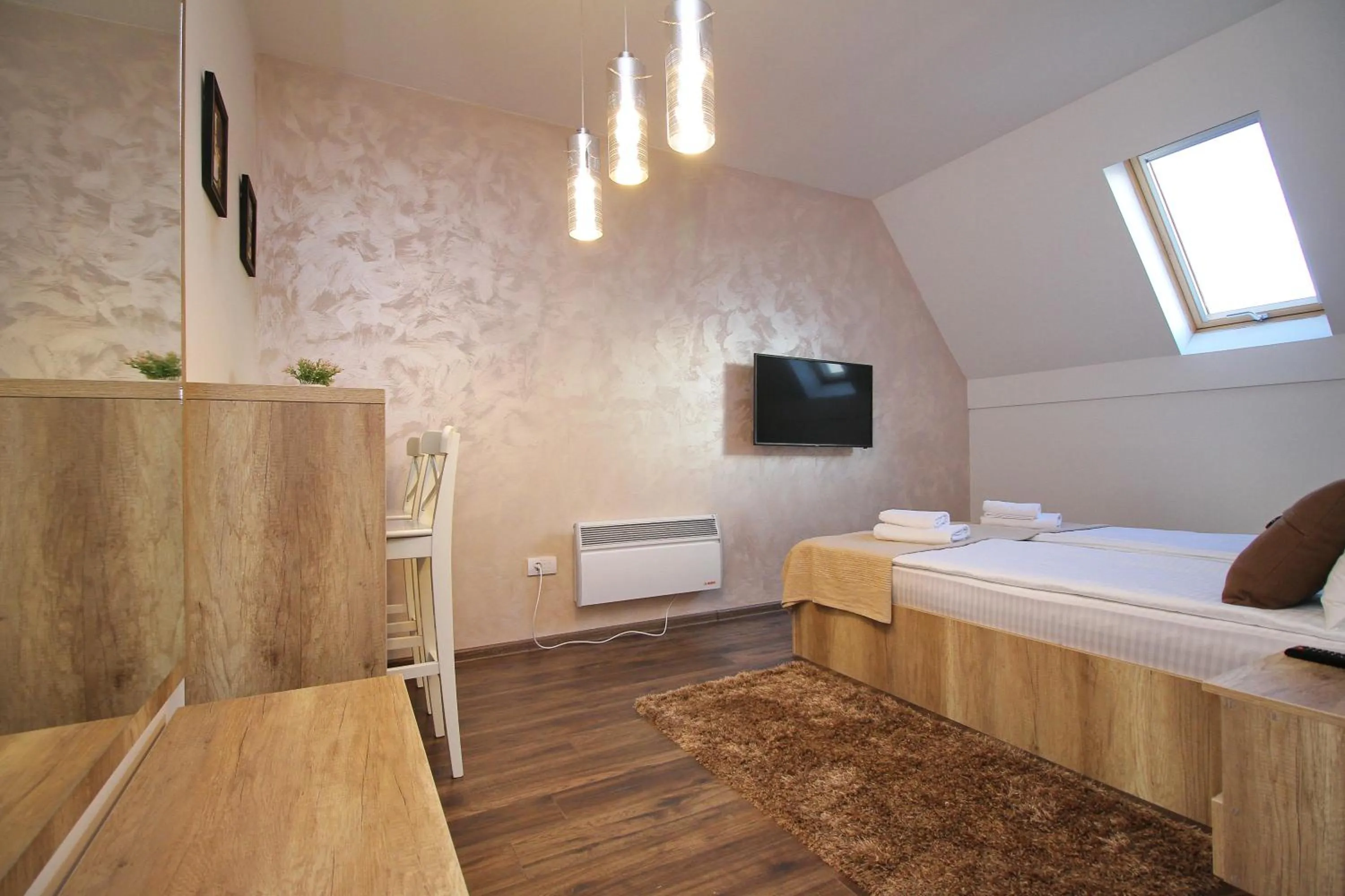 Photo of the whole room, Bed in All Seasons Residence