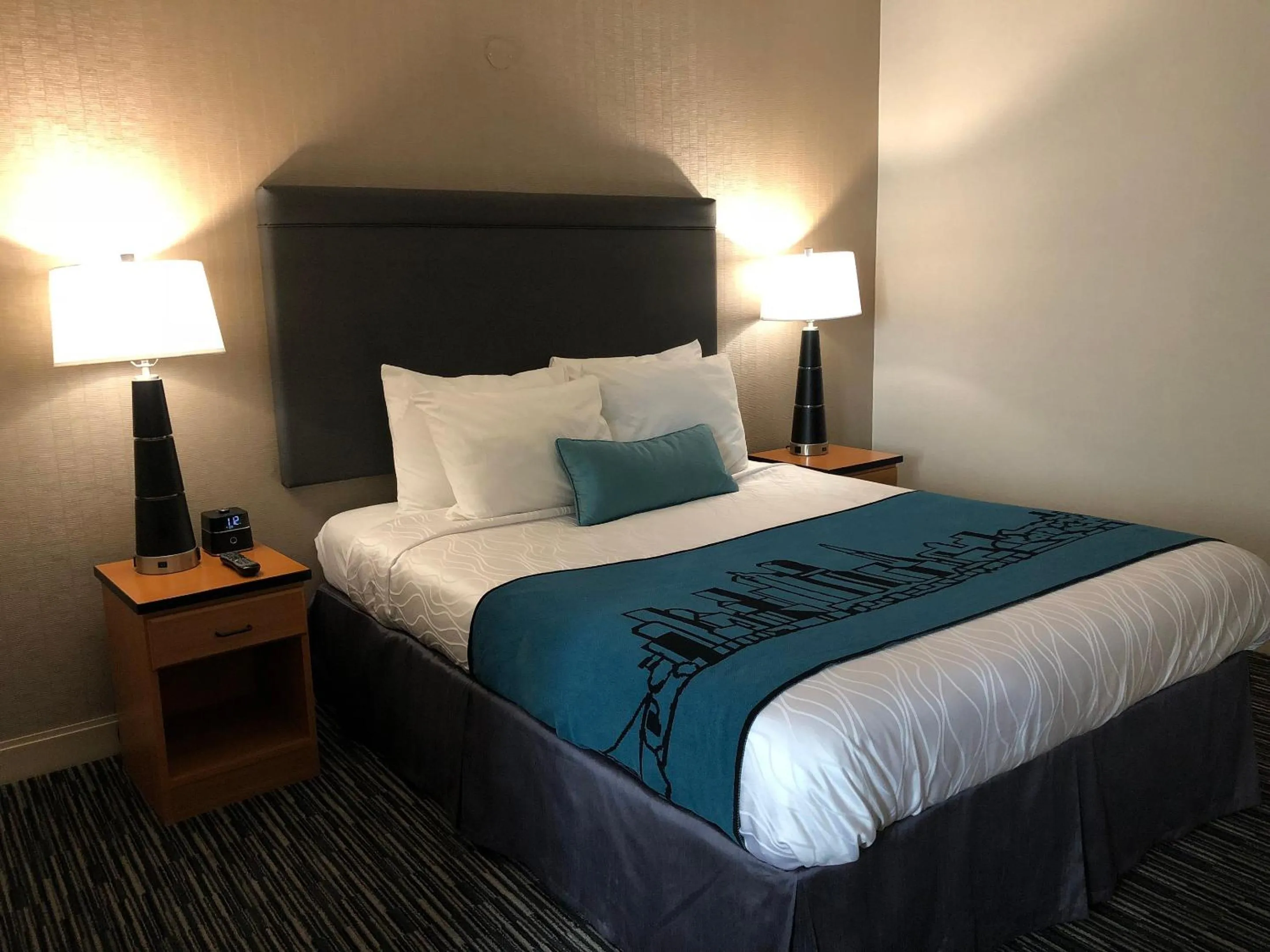 Bed in City Center Inn and Suites