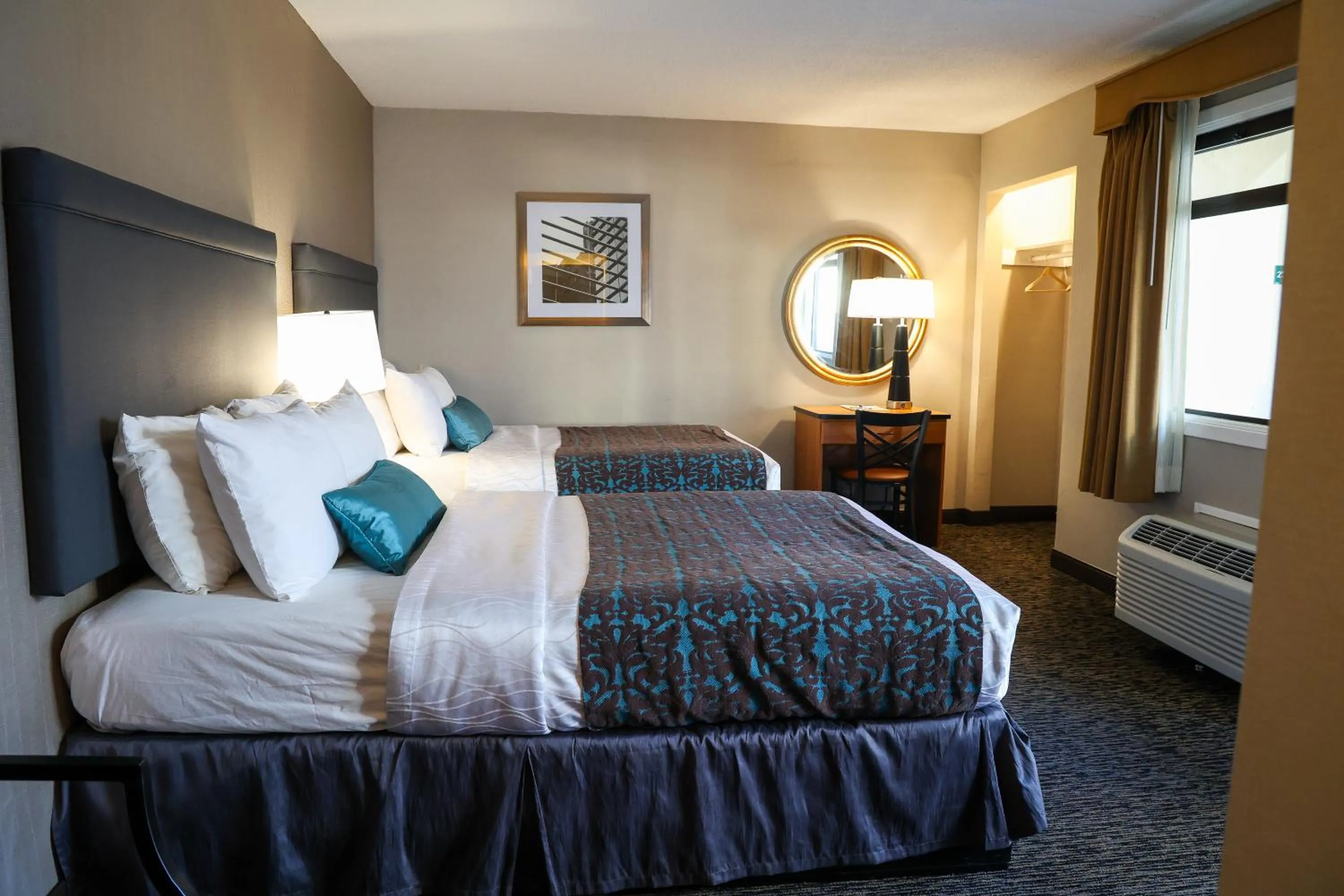 Bed in City Center Inn and Suites