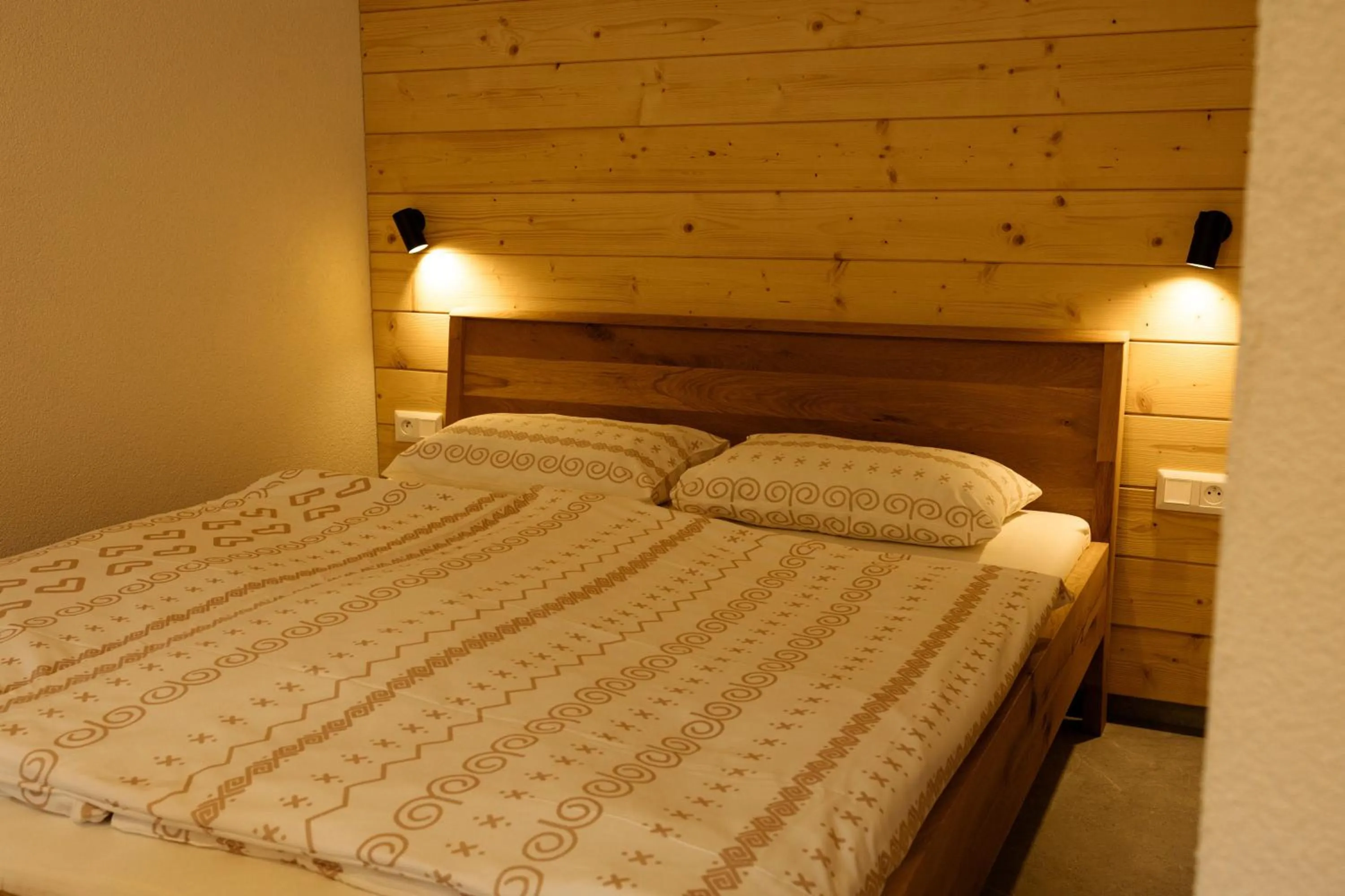 Bed in YASNA Apartments