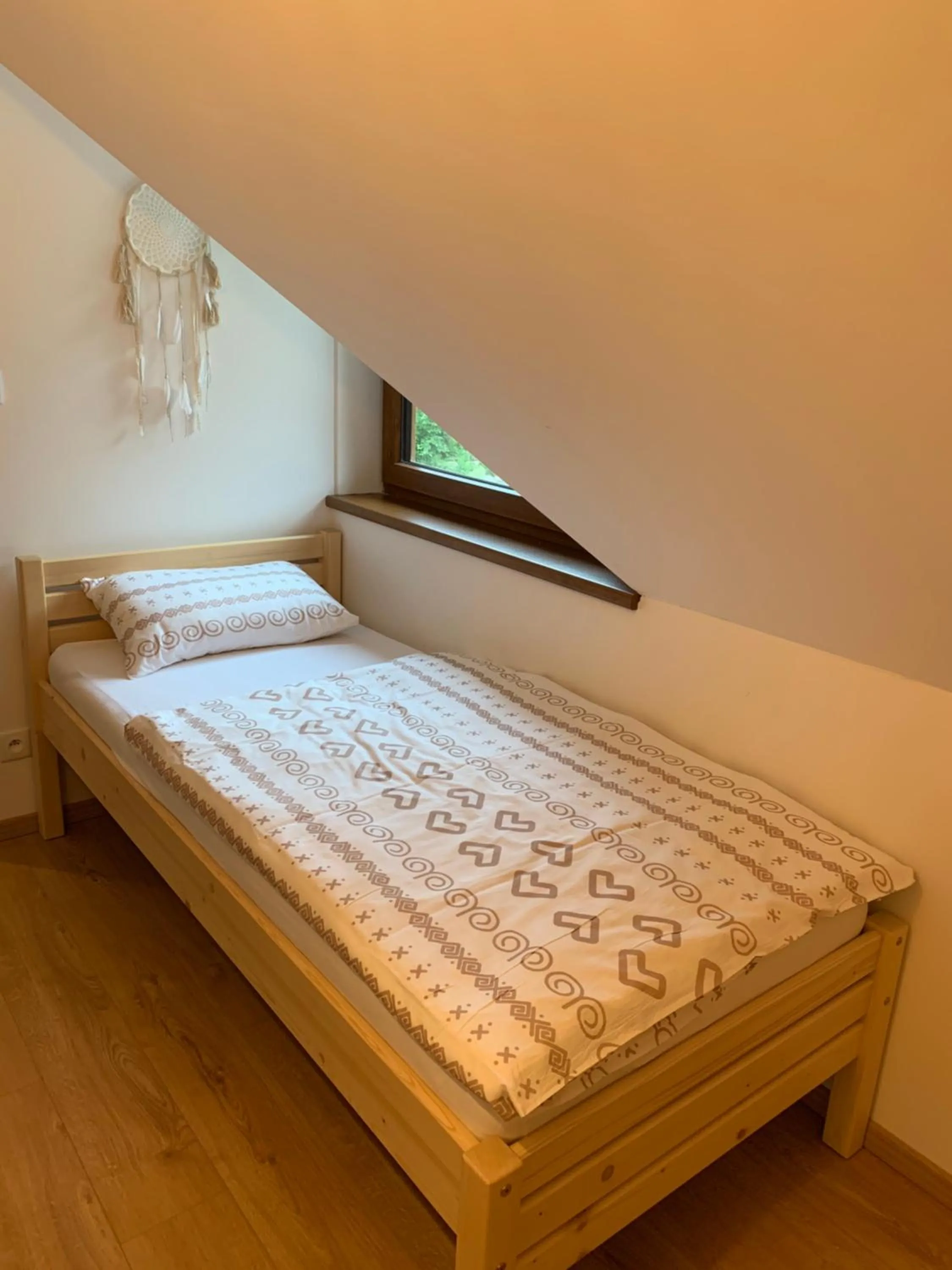 Bed in YASNA Apartments