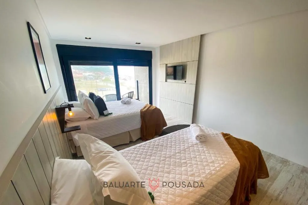 Bed in BALUARTE POUSADA