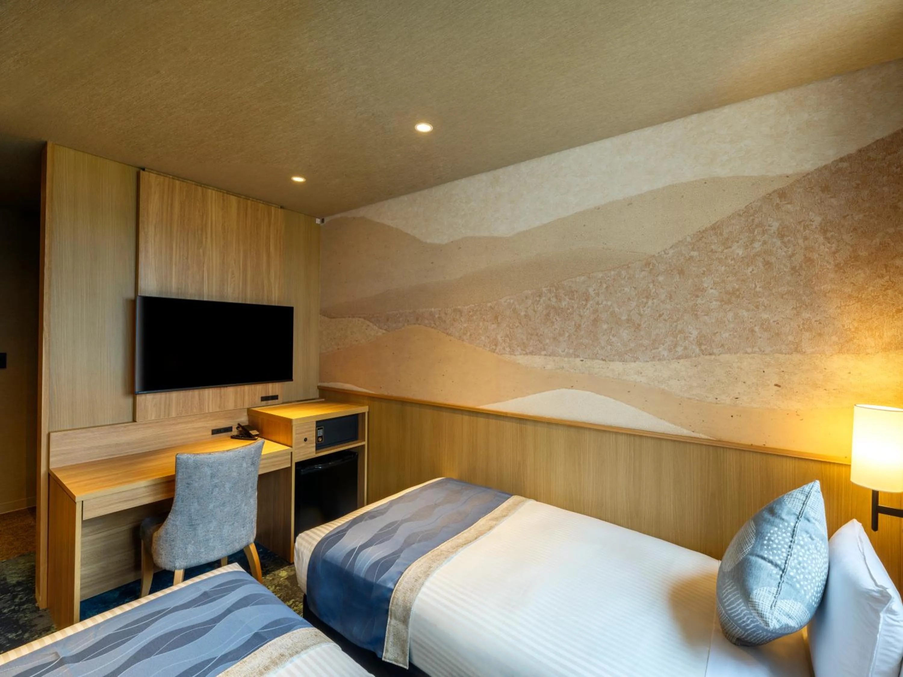 Bed in KAMENOI HOTEL Oarai