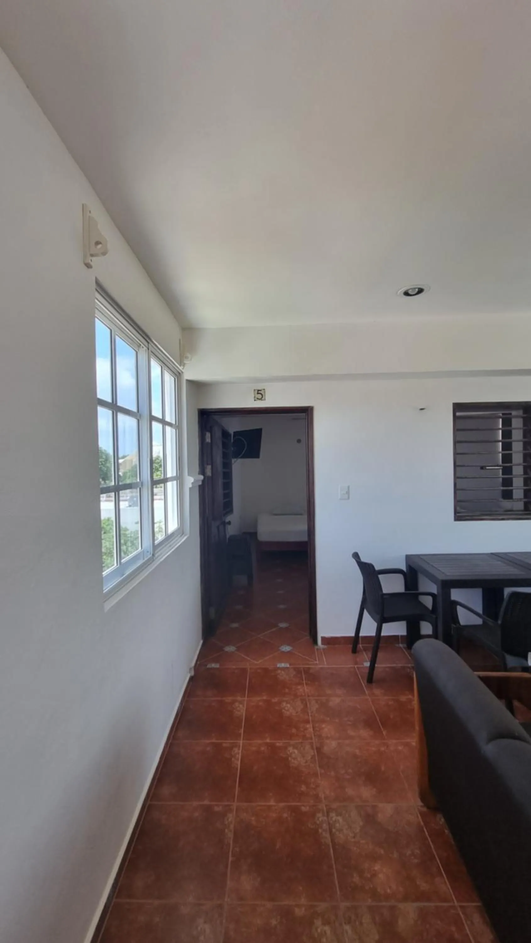 Living room in A una calle del ado 5ta avenida