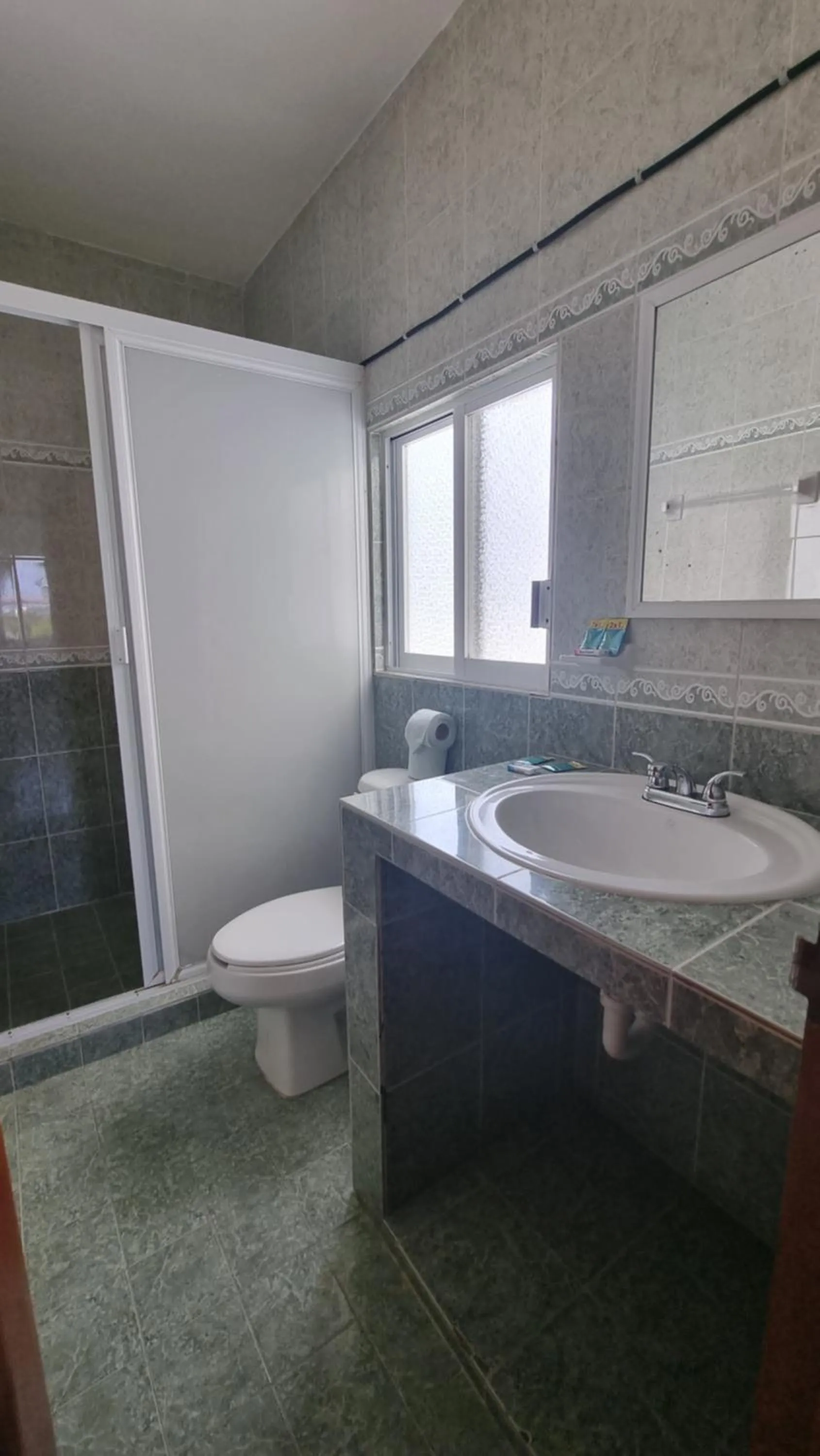 Bathroom in A una calle del ado 5ta avenida