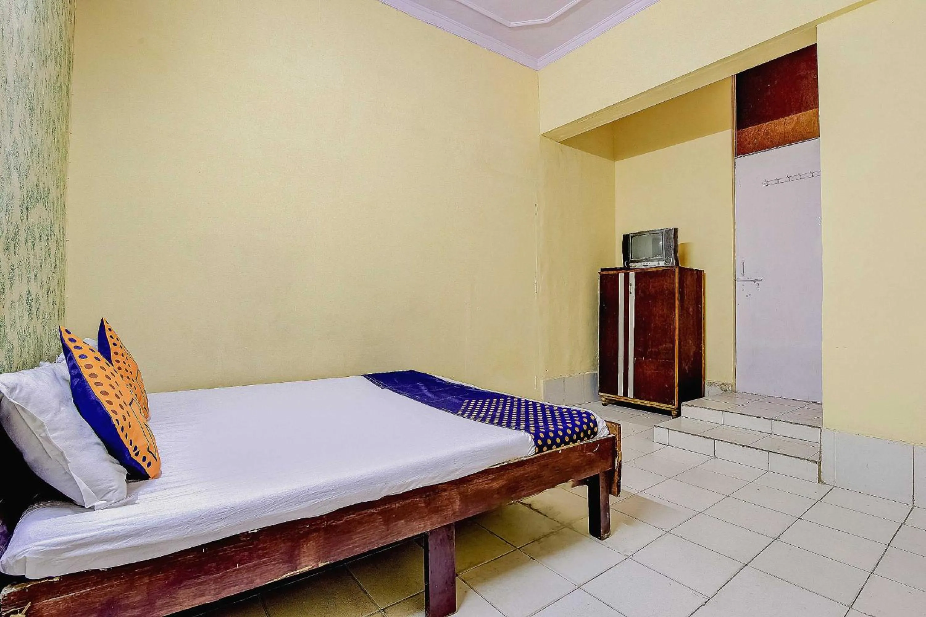 Bedroom in Spot On Swagat Palace