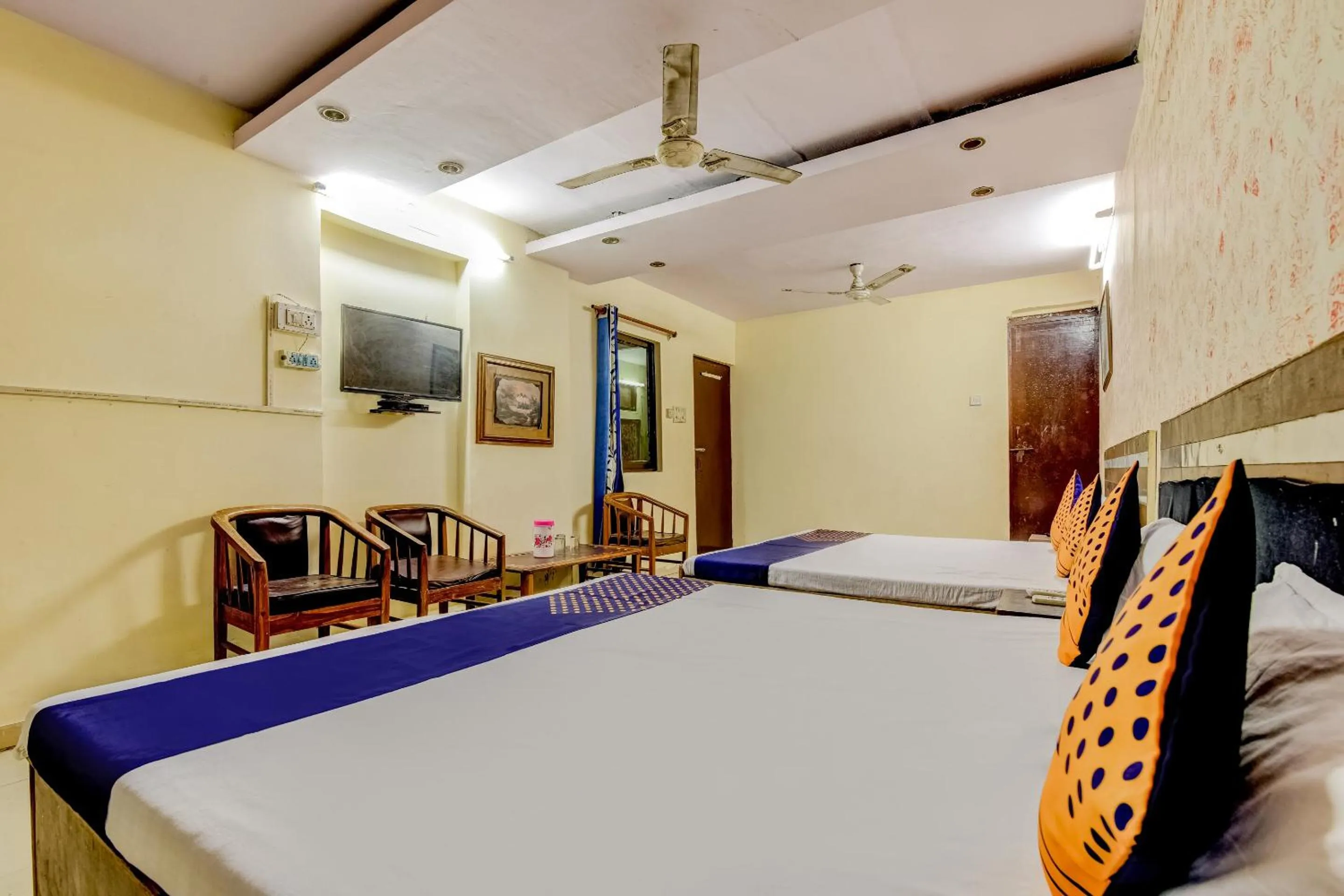 Bedroom, Bed in Spot On Swagat Palace