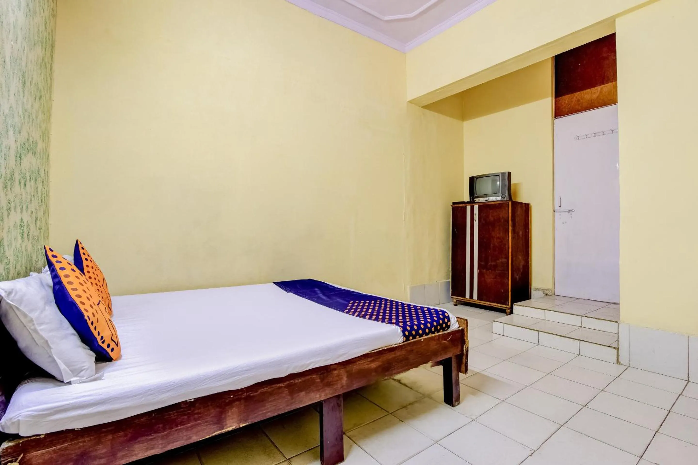 Bedroom in Spot On Swagat Palace