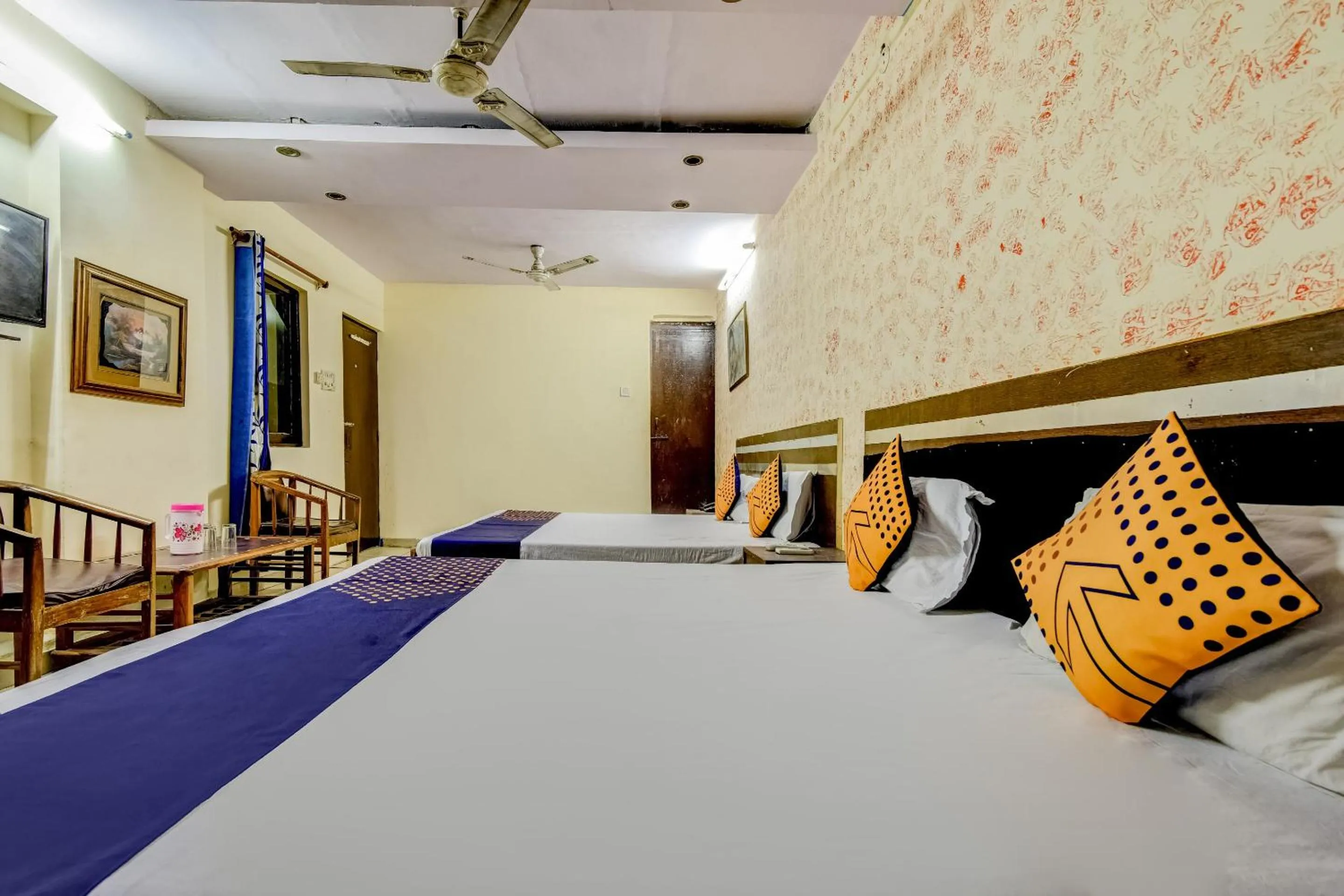 Bedroom, Bed in Spot On Swagat Palace