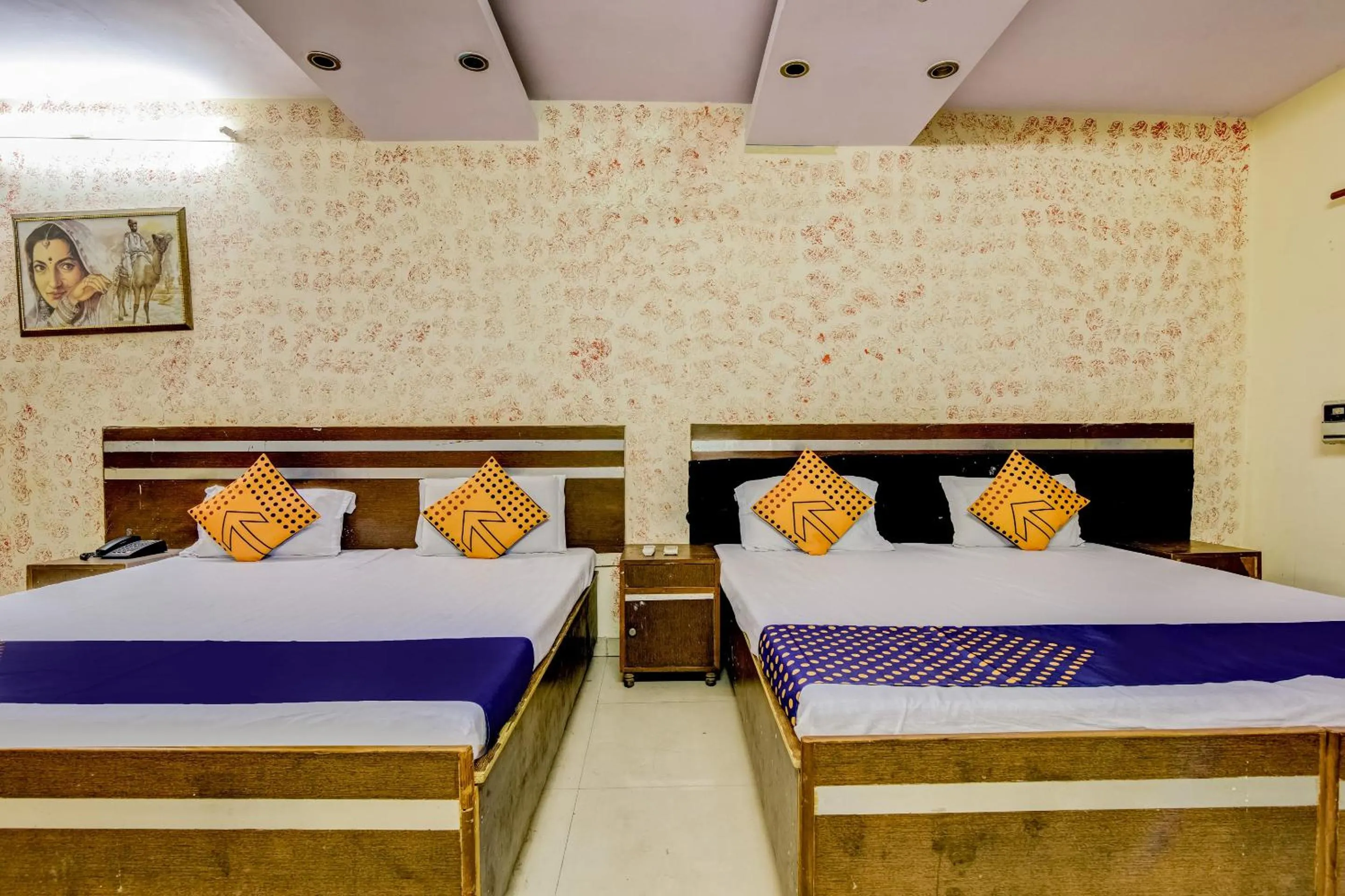 Bedroom, Bed in Spot On Swagat Palace