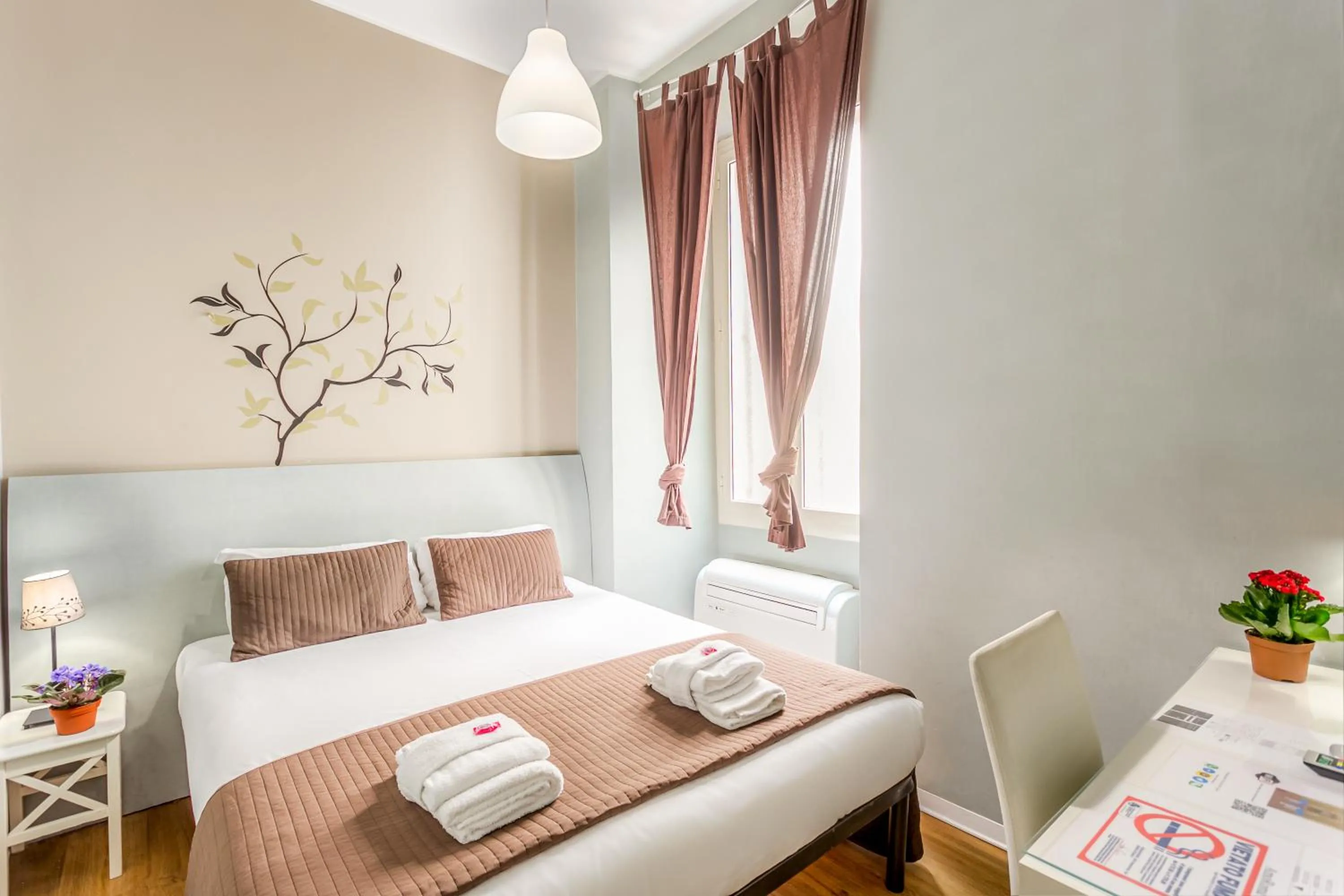 Bed in AmoRoma Suite