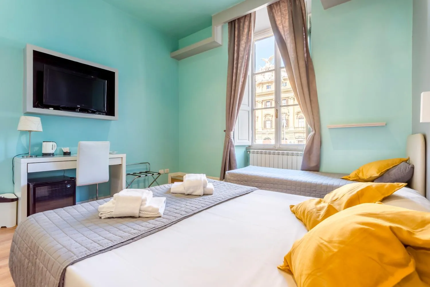 Bed in AmoRoma Suite