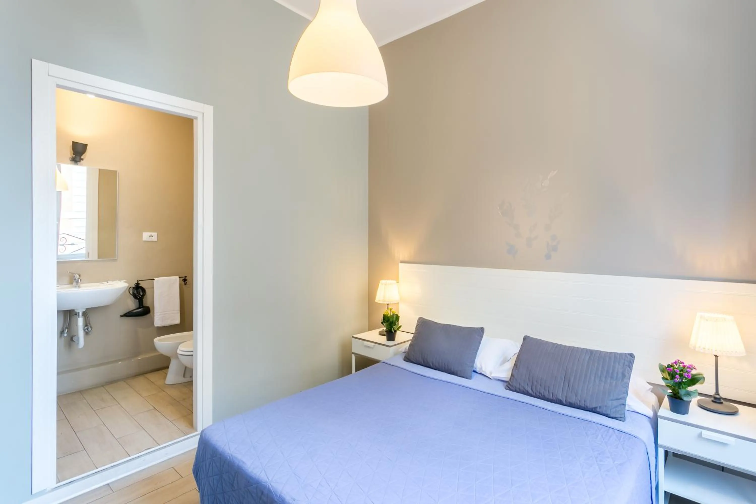 Bed in AmoRoma Suite