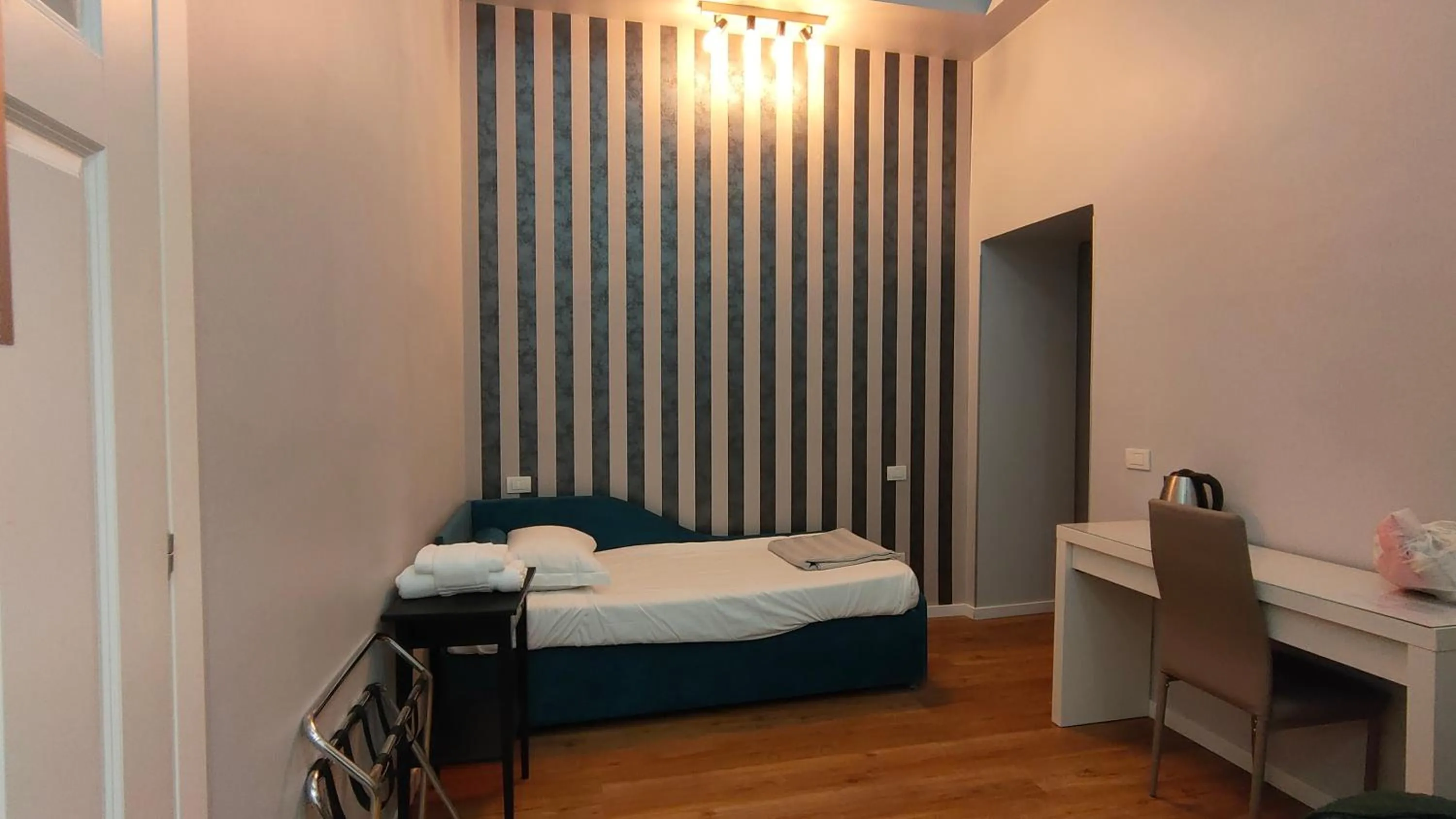 Bed in AmoRoma Suite